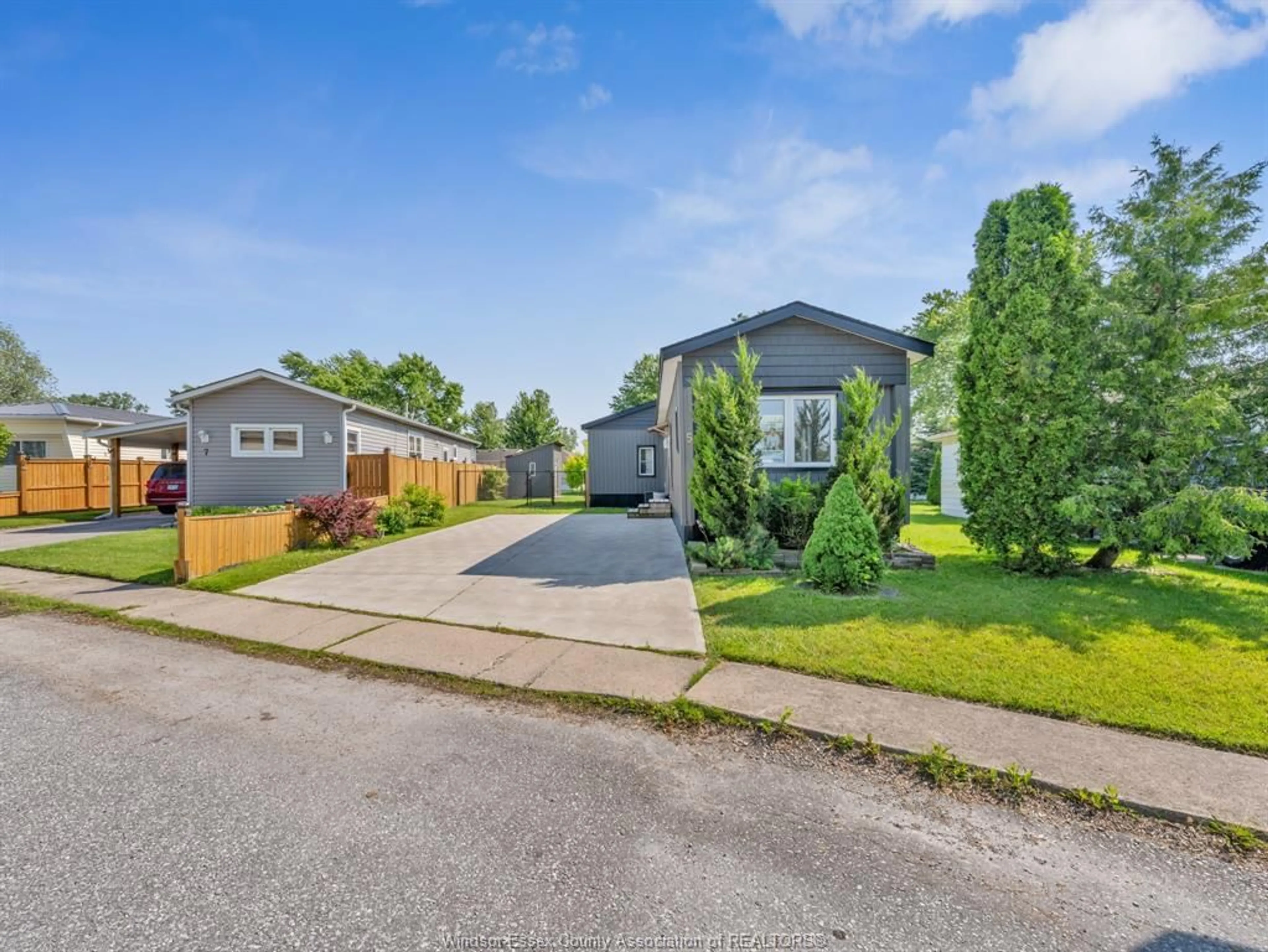 A pic from outside/outdoor area/front of a property/back of a property/a pic from drone, street for 5 MAPLE Dr, McGregor Ontario N0R 1J0