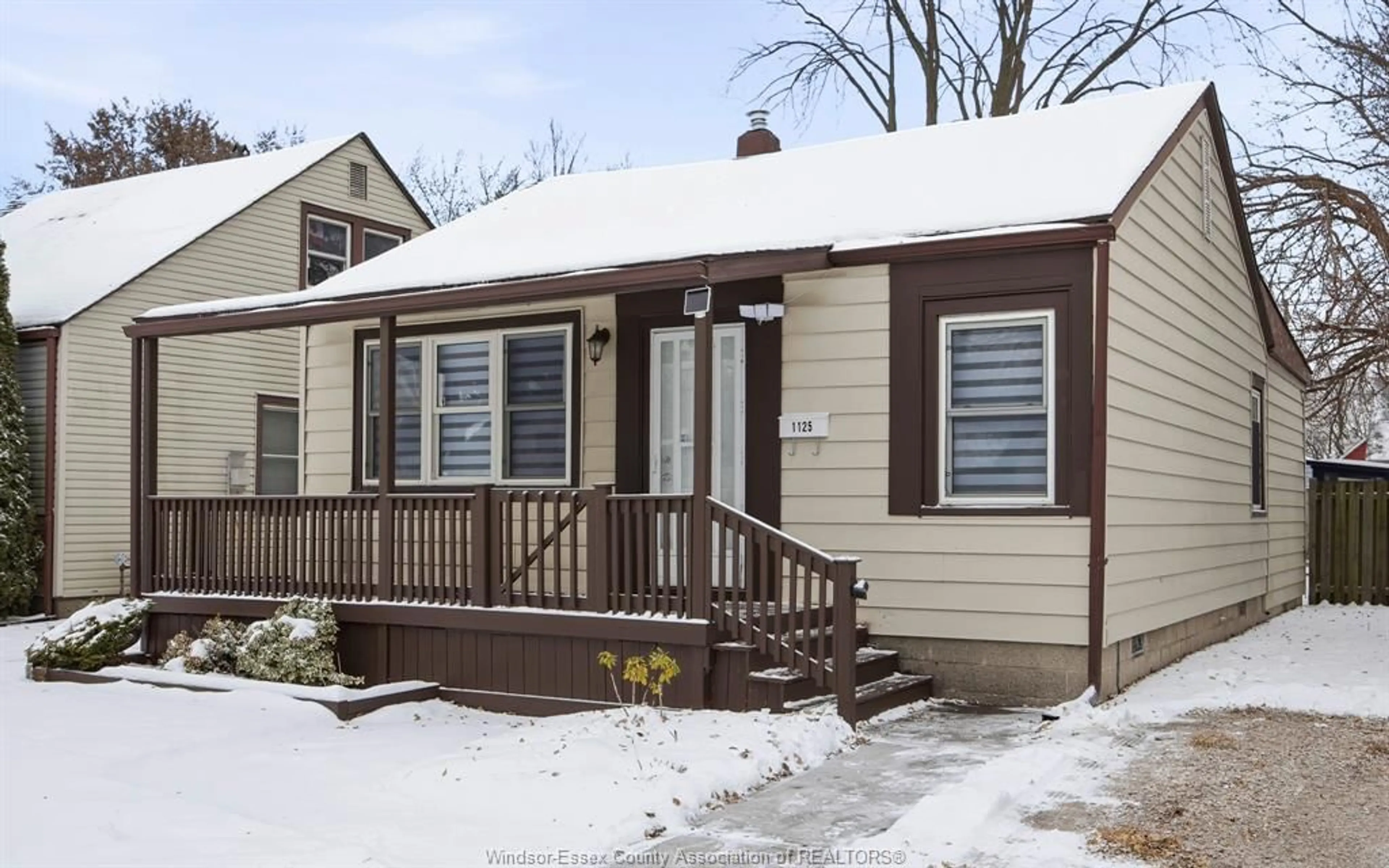 Home with vinyl exterior material, street for 1125 LENA Ave, Windsor Ontario N9C 3K5