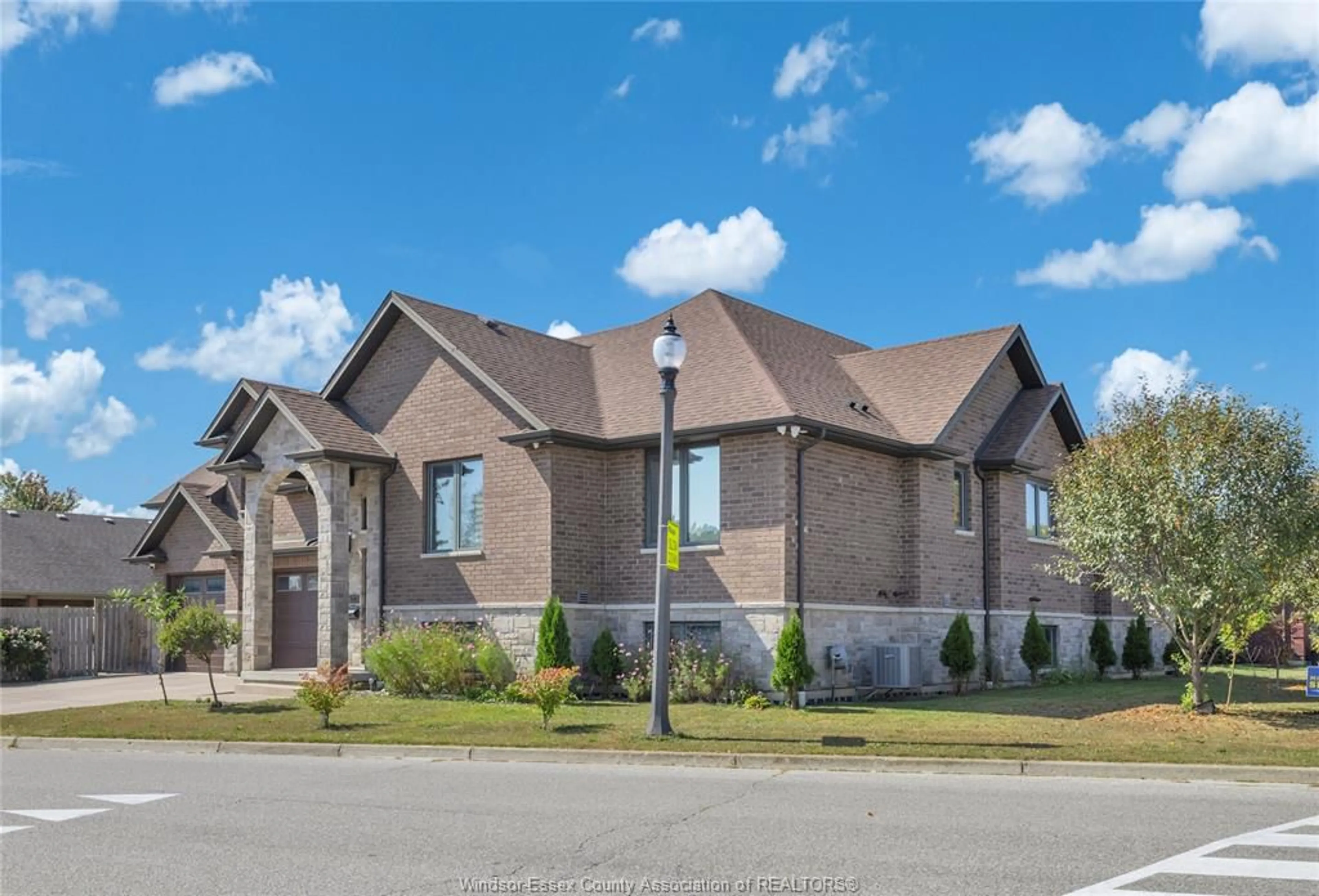 Home with brick exterior material, street for 498 SACRED HEART Dr, LaSalle Ontario N9J 0A6