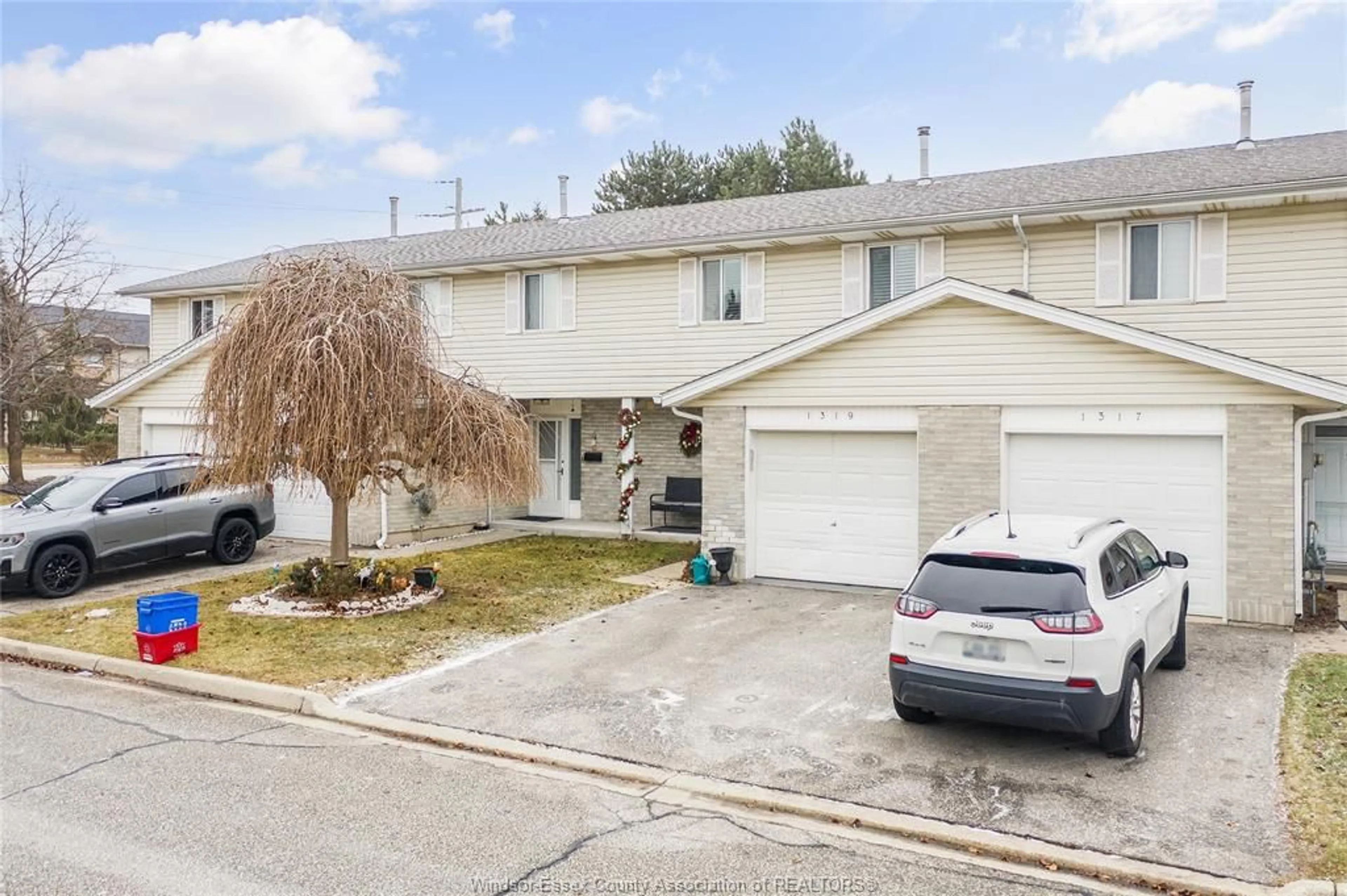 A pic from outside/outdoor area/front of a property/back of a property/a pic from drone, street for 1319 CARDINAL Cres, Tecumseh Ontario N9A 6V7