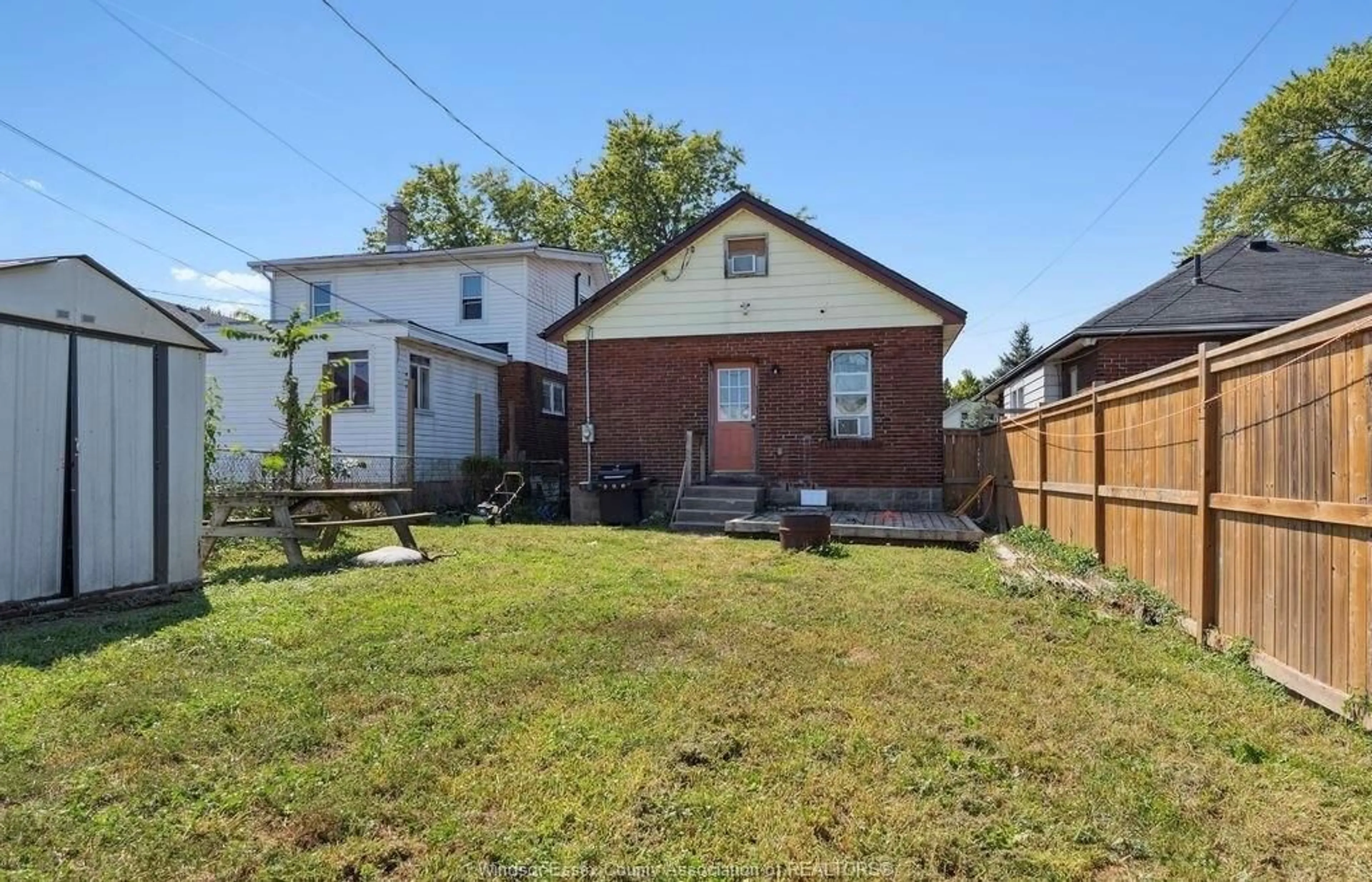 A pic from outside/outdoor area/front of a property/back of a property/a pic from drone, street for 1030 OAK St, Windsor Ontario N9A 5G4