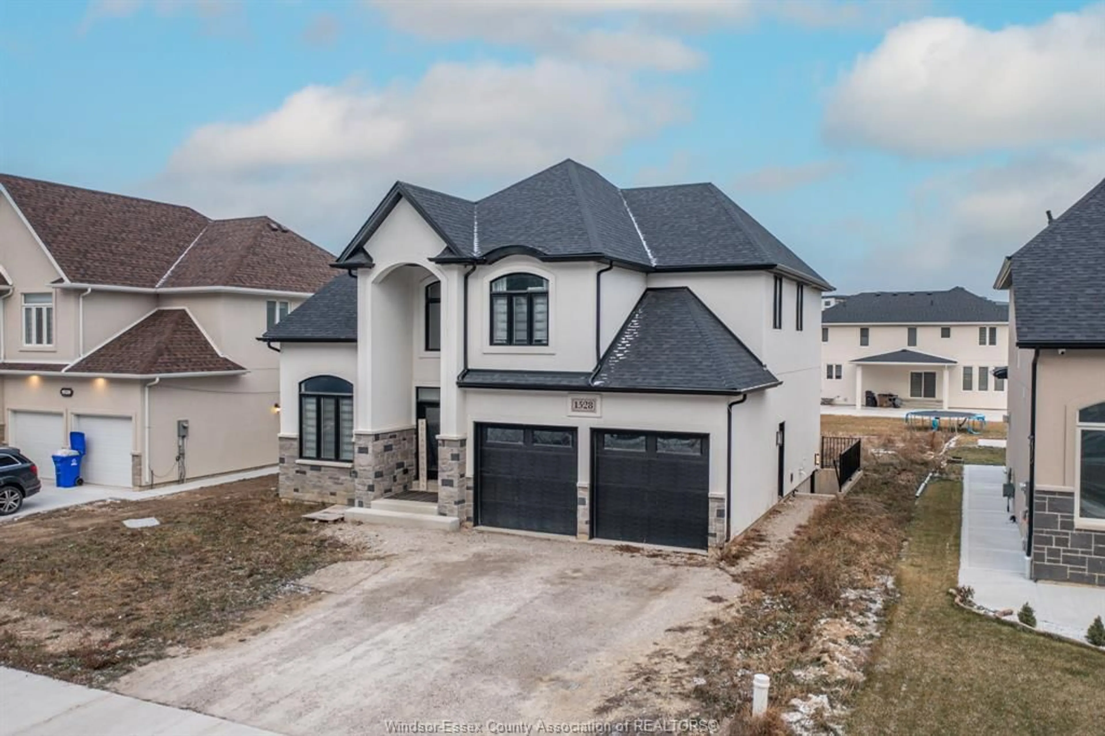 A pic from outside/outdoor area/front of a property/back of a property/a pic from drone, street for 1528 BOWLER Dr, Windsor Ontario N8S 0A8