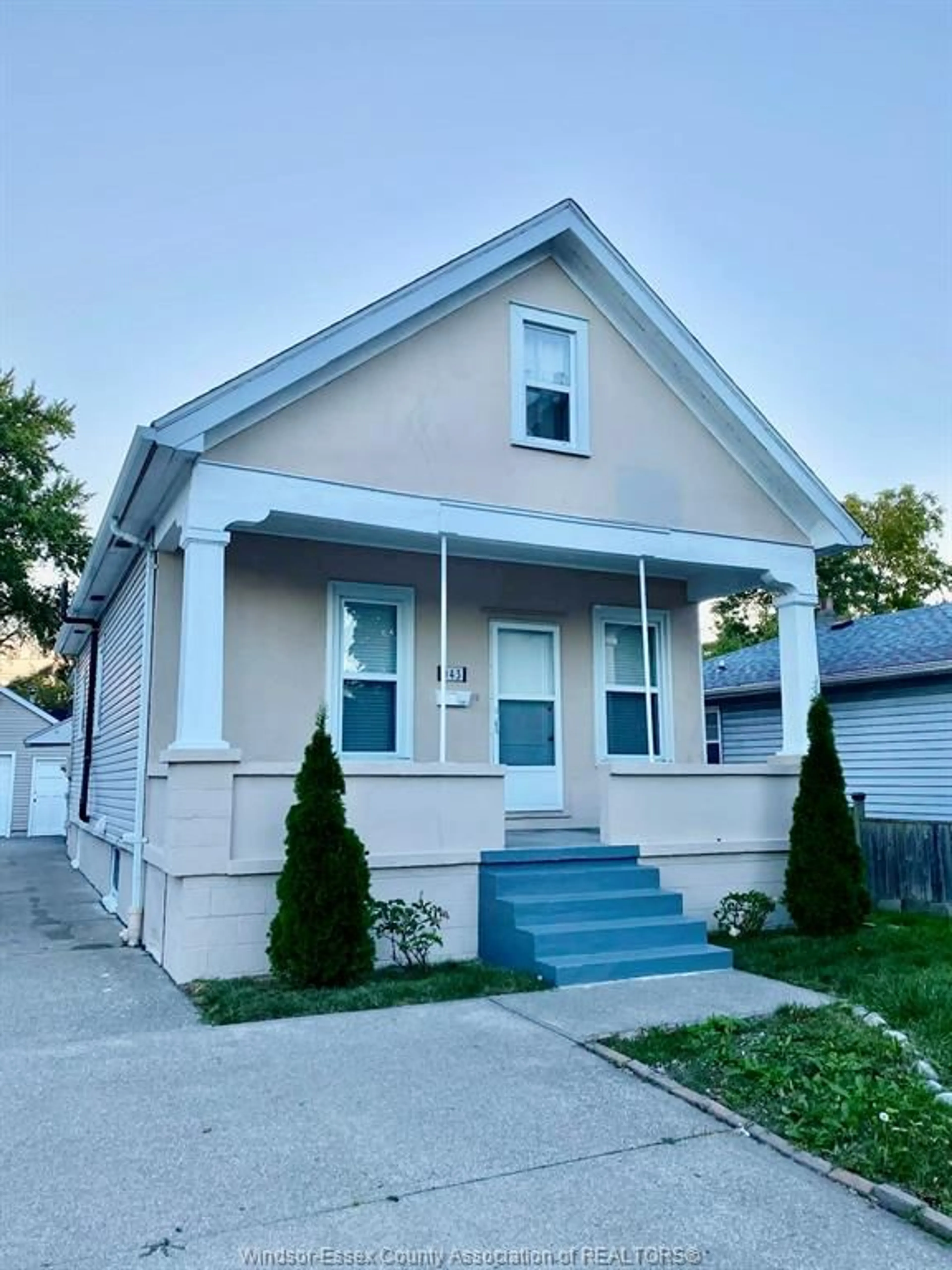 Home with vinyl exterior material, street for 943 LAUZON Rd, Windsor Ontario N8S 3M4