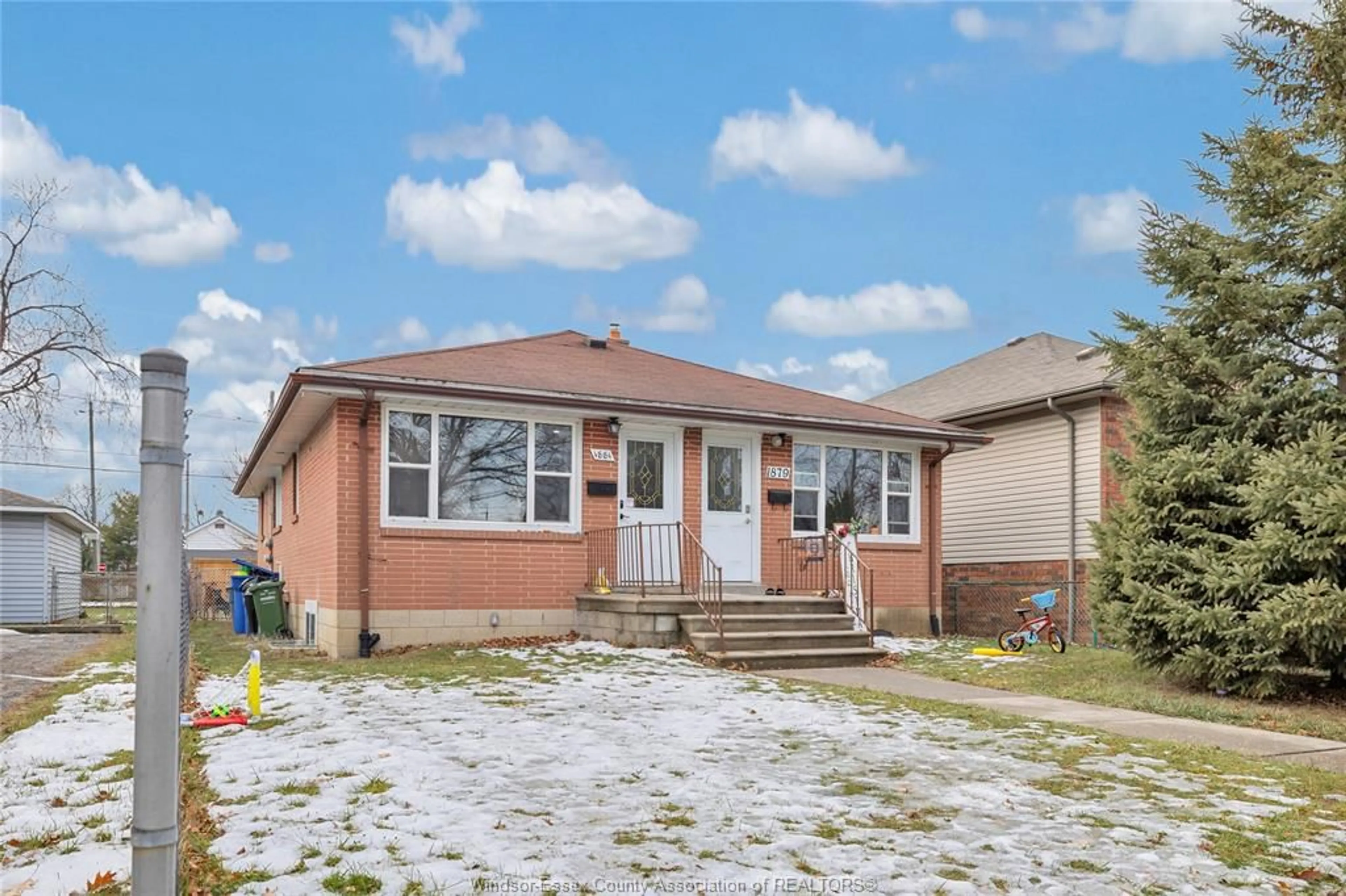 Home with brick exterior material, street for 1879-81 FORD, Windsor Ontario N8T 2E2