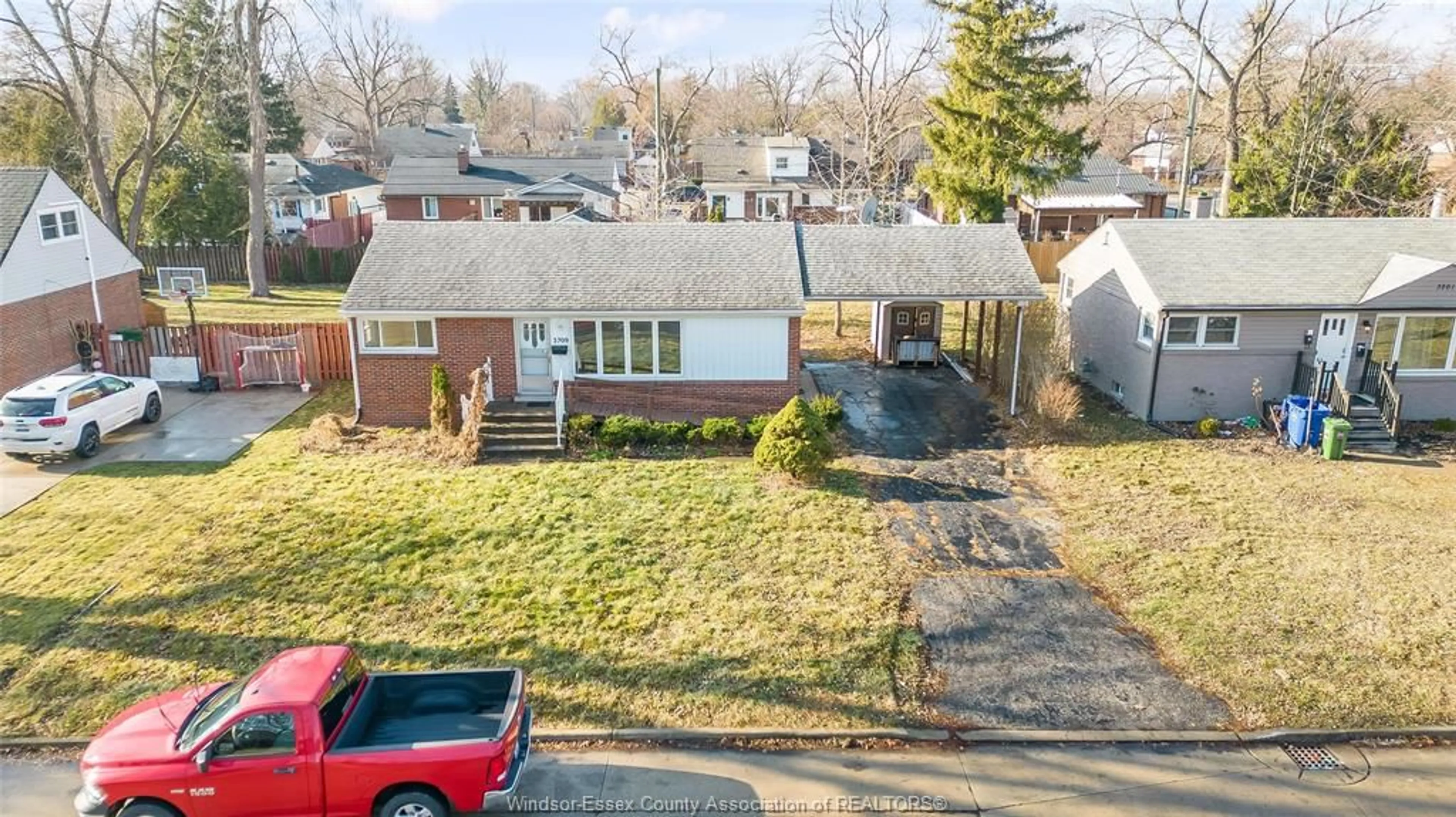 A pic from outside/outdoor area/front of a property/back of a property/a pic from drone, street for 3209 DANDURAND, Windsor Ontario N9E 2E9