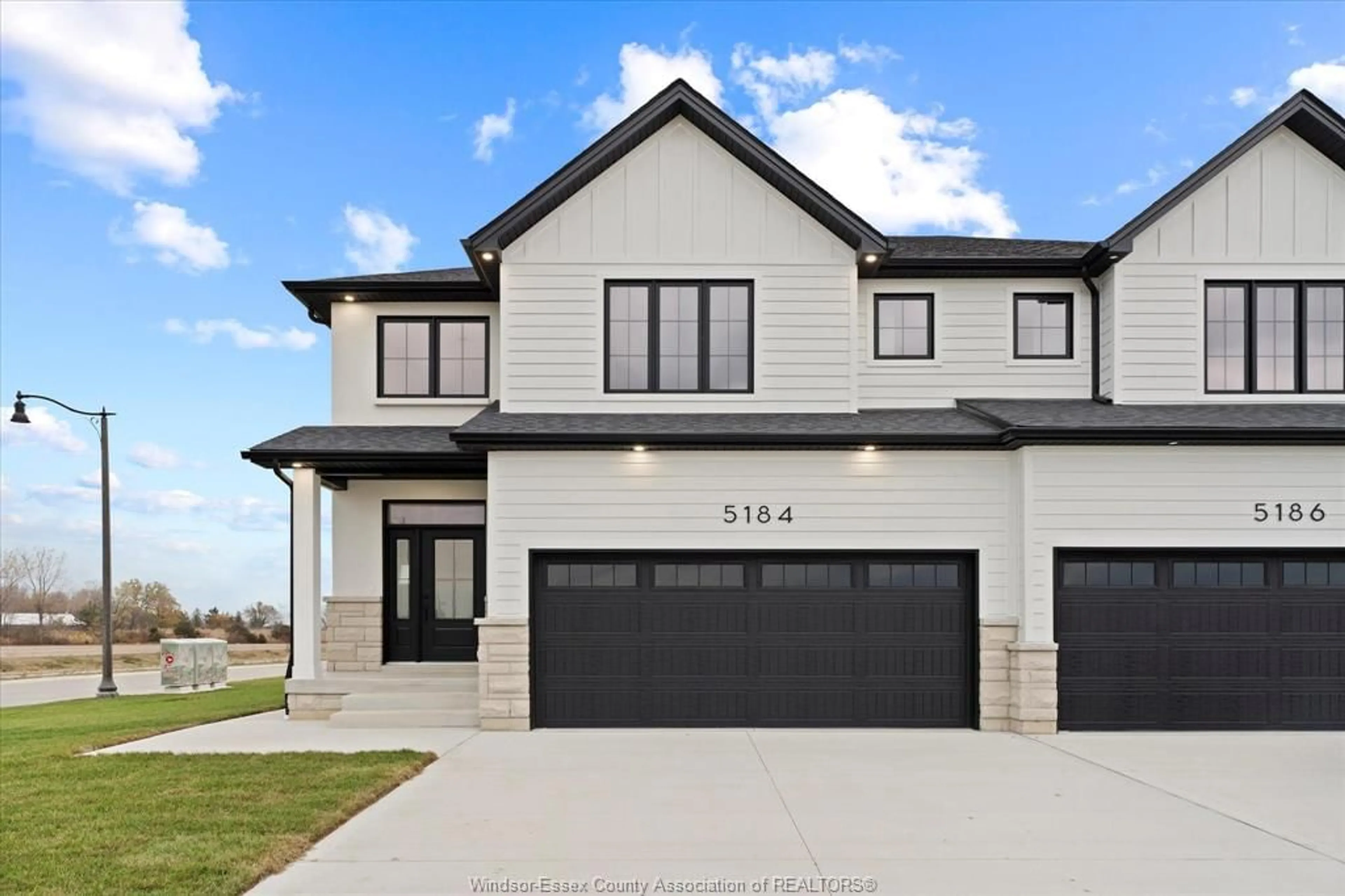 Home with vinyl exterior material, street for 5184 TALIA Trail, Tecumseh Ontario N0R 1K0