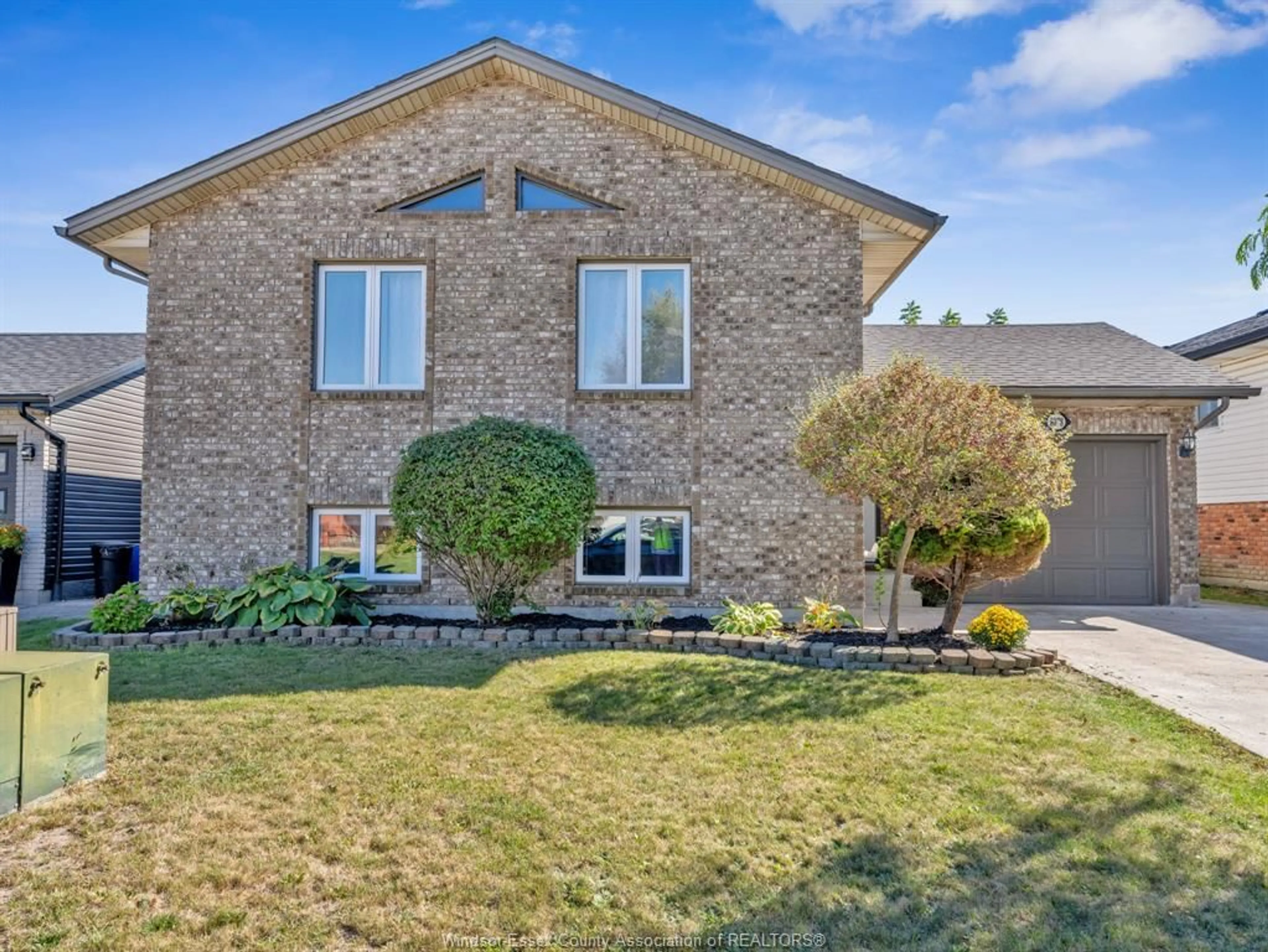 Home with brick exterior material, street for 8078 FAHOLO, Windsor Ontario N8R 2H1