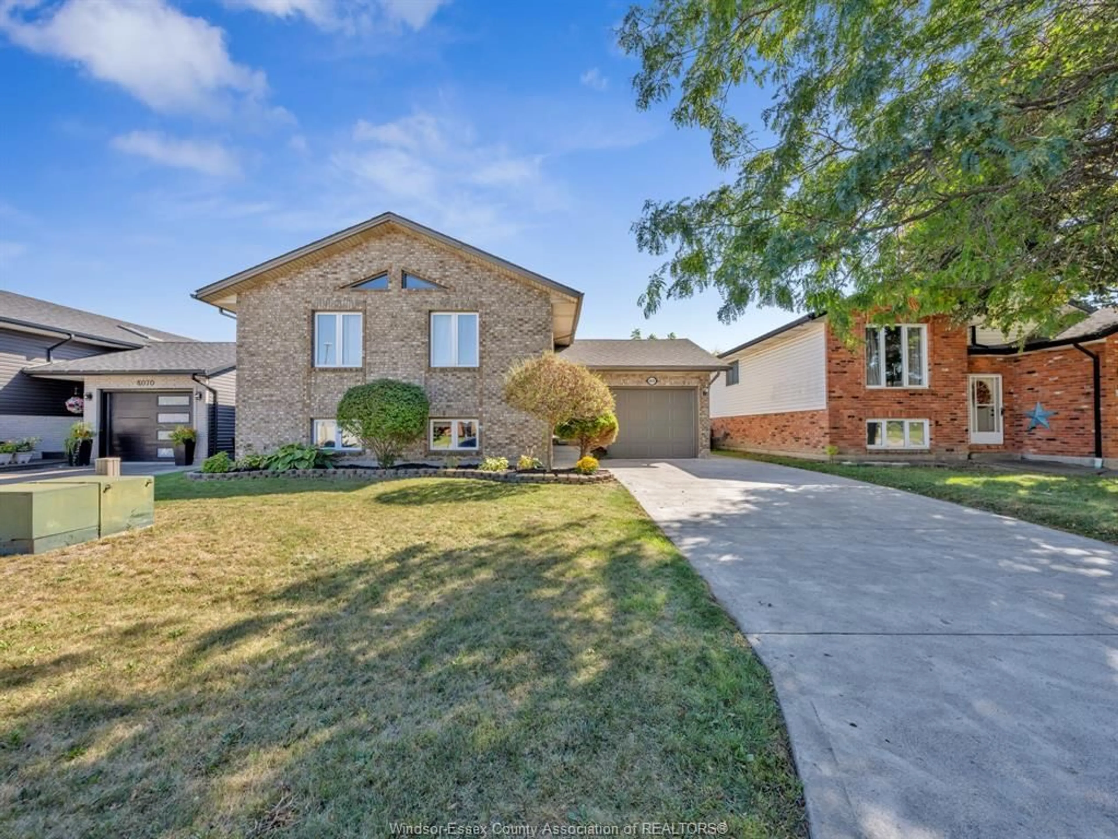 Home with brick exterior material, street for 8078 FAHOLO, Windsor Ontario N8R 2H1