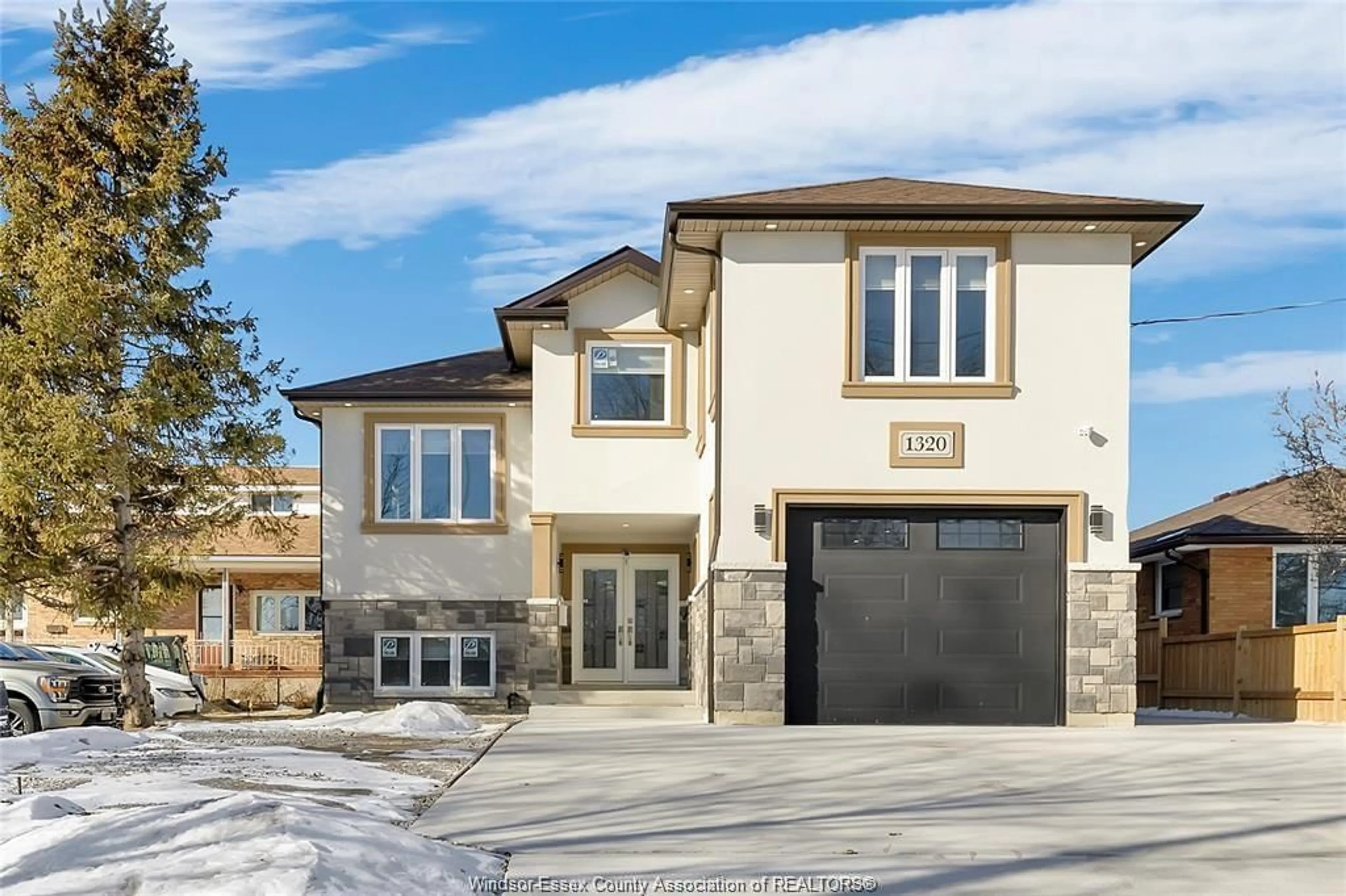 Home with brick exterior material, street for 1320 GRAND MARAIS Rd, Windsor Ontario N8W 1W2