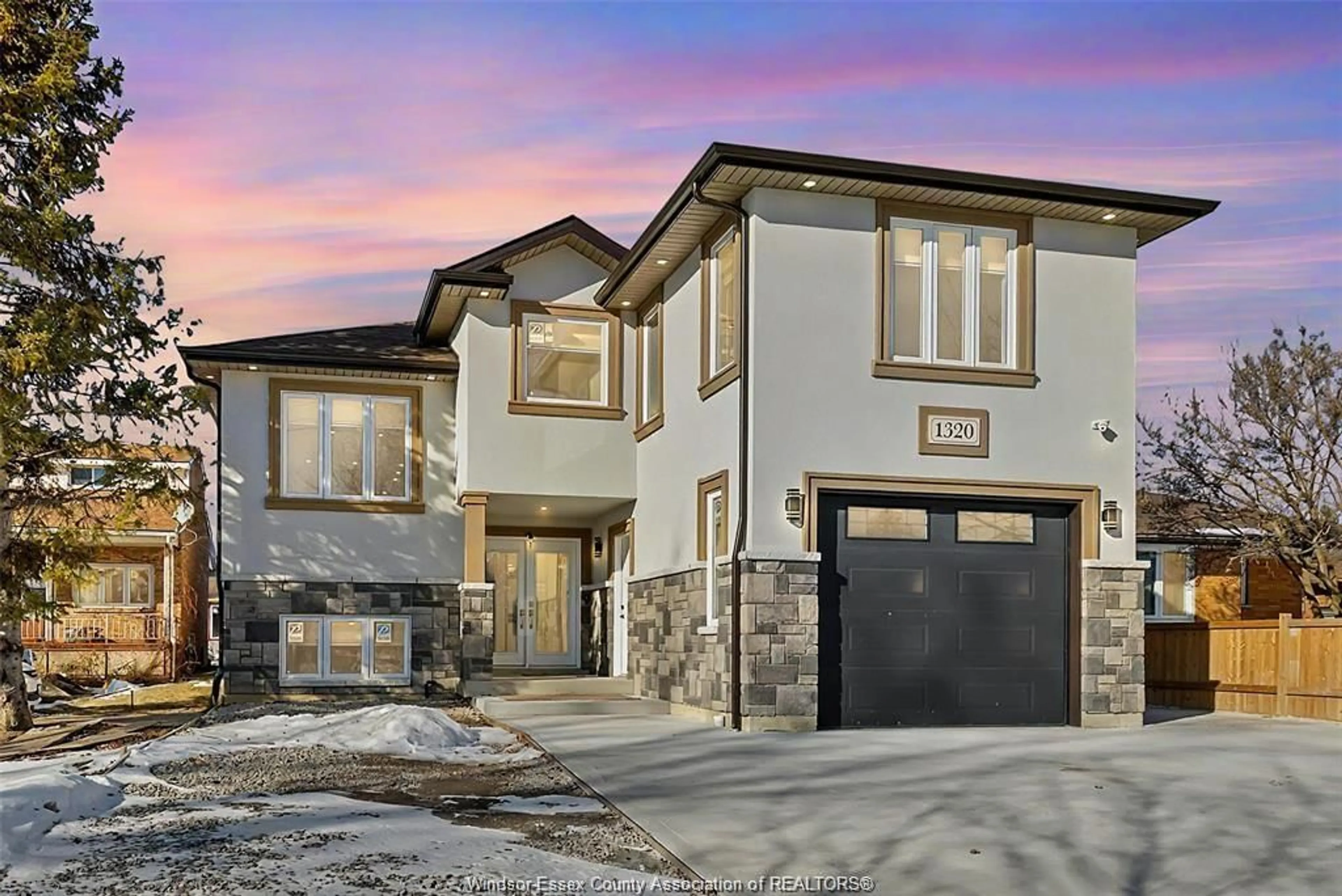 Home with brick exterior material, street for 1320 GRAND MARAIS Rd, Windsor Ontario N8W 1W2