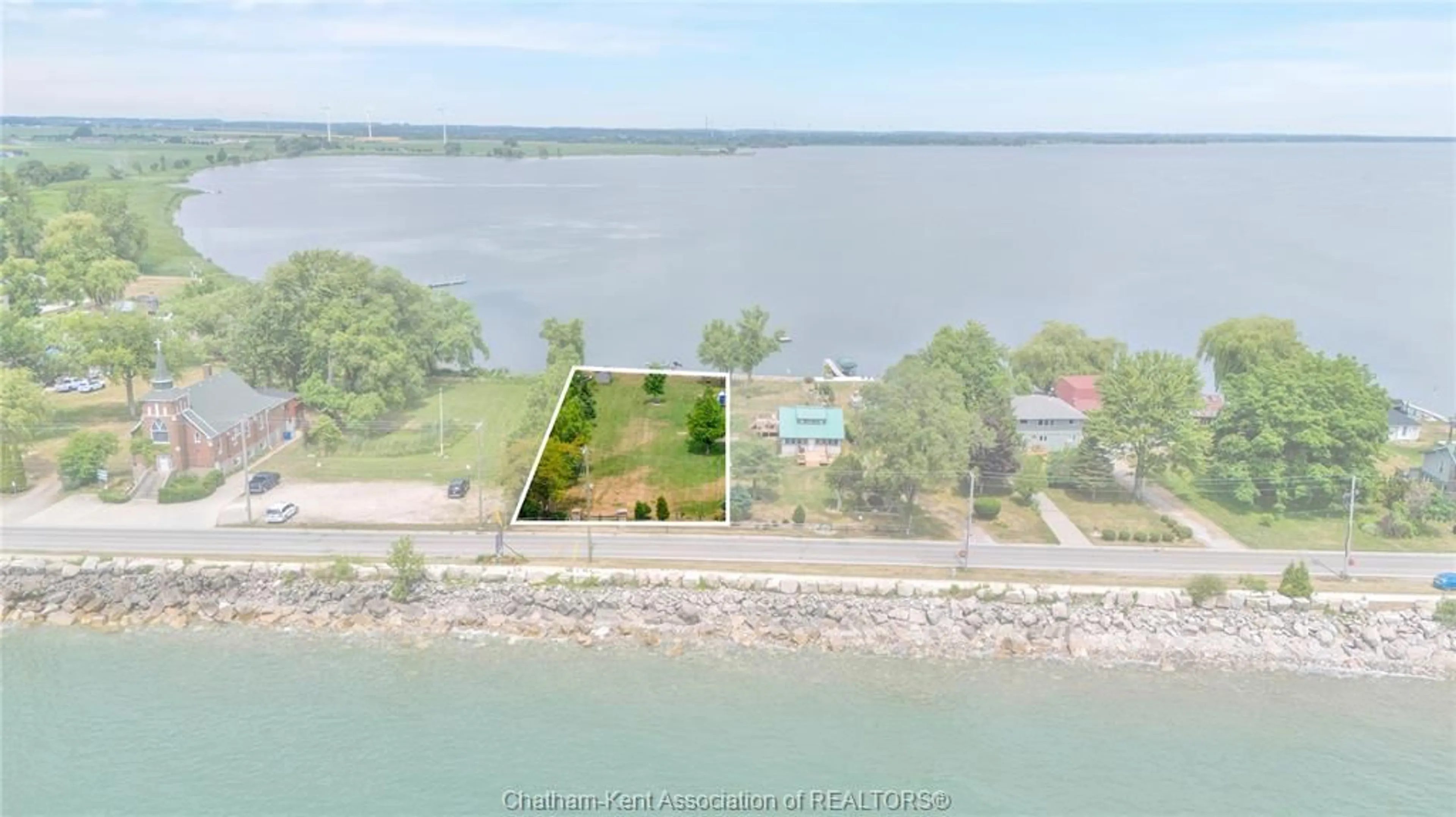 A pic from outside/outdoor area/front of a property/back of a property/a pic from drone, water/lake/river/ocean view for 100 ROSS Lane, Erieau Ontario N0P 1N0