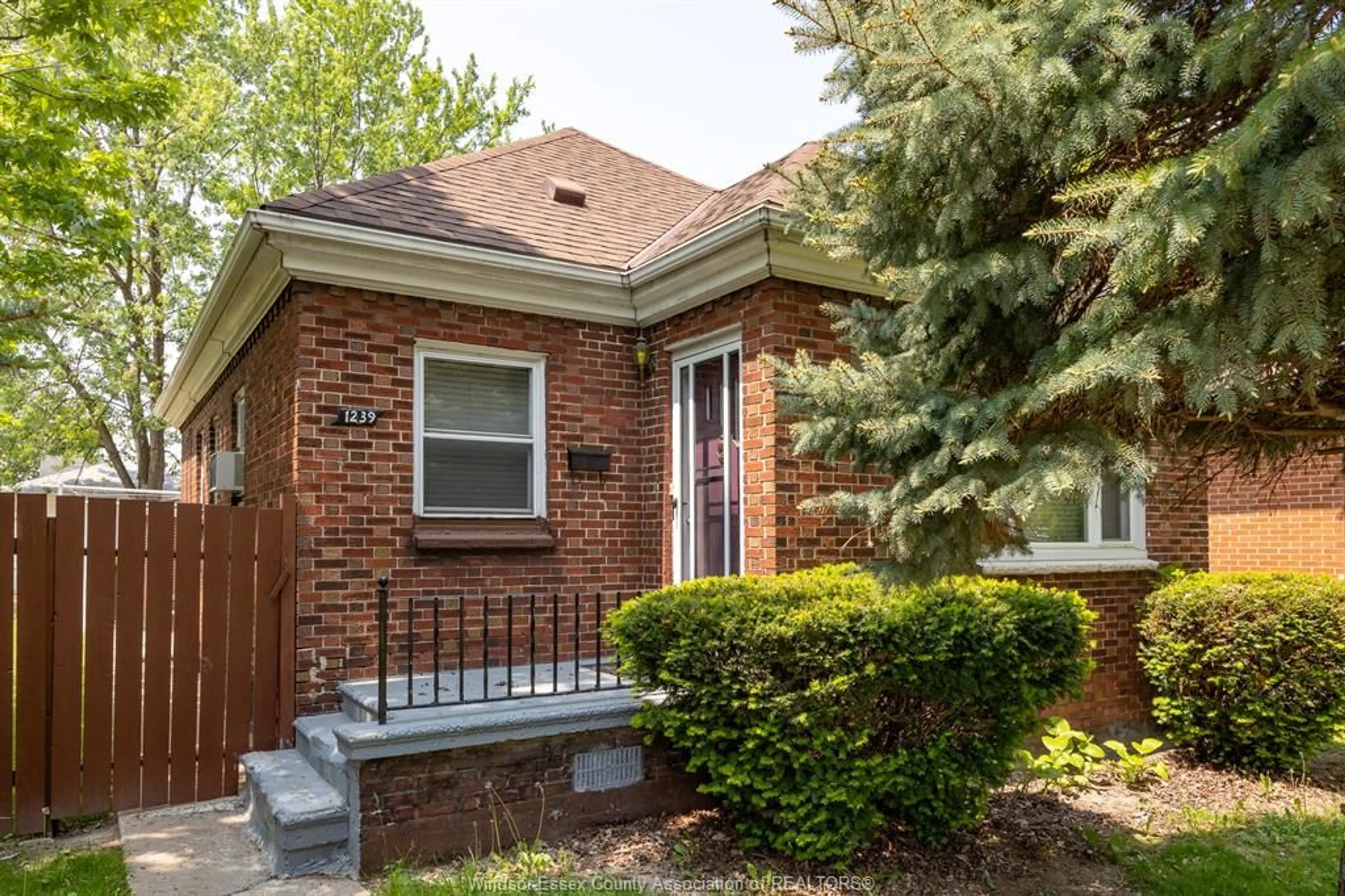 Home with brick exterior material, street for 1239 MCEWAN Ave, Windsor Ontario N9B 2G5
