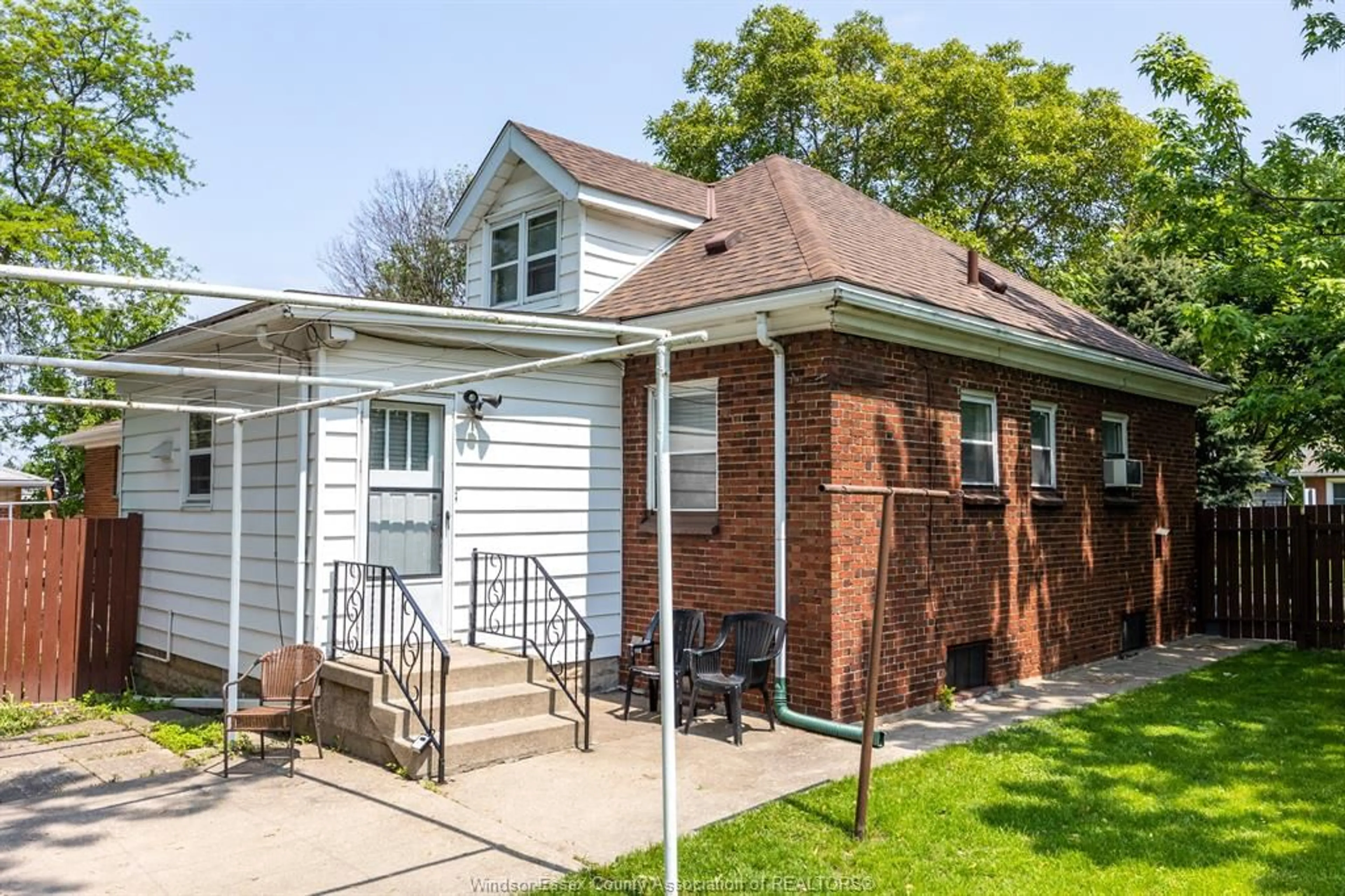Home with brick exterior material, street for 1239 MCEWAN Ave, Windsor Ontario N9B 2G5
