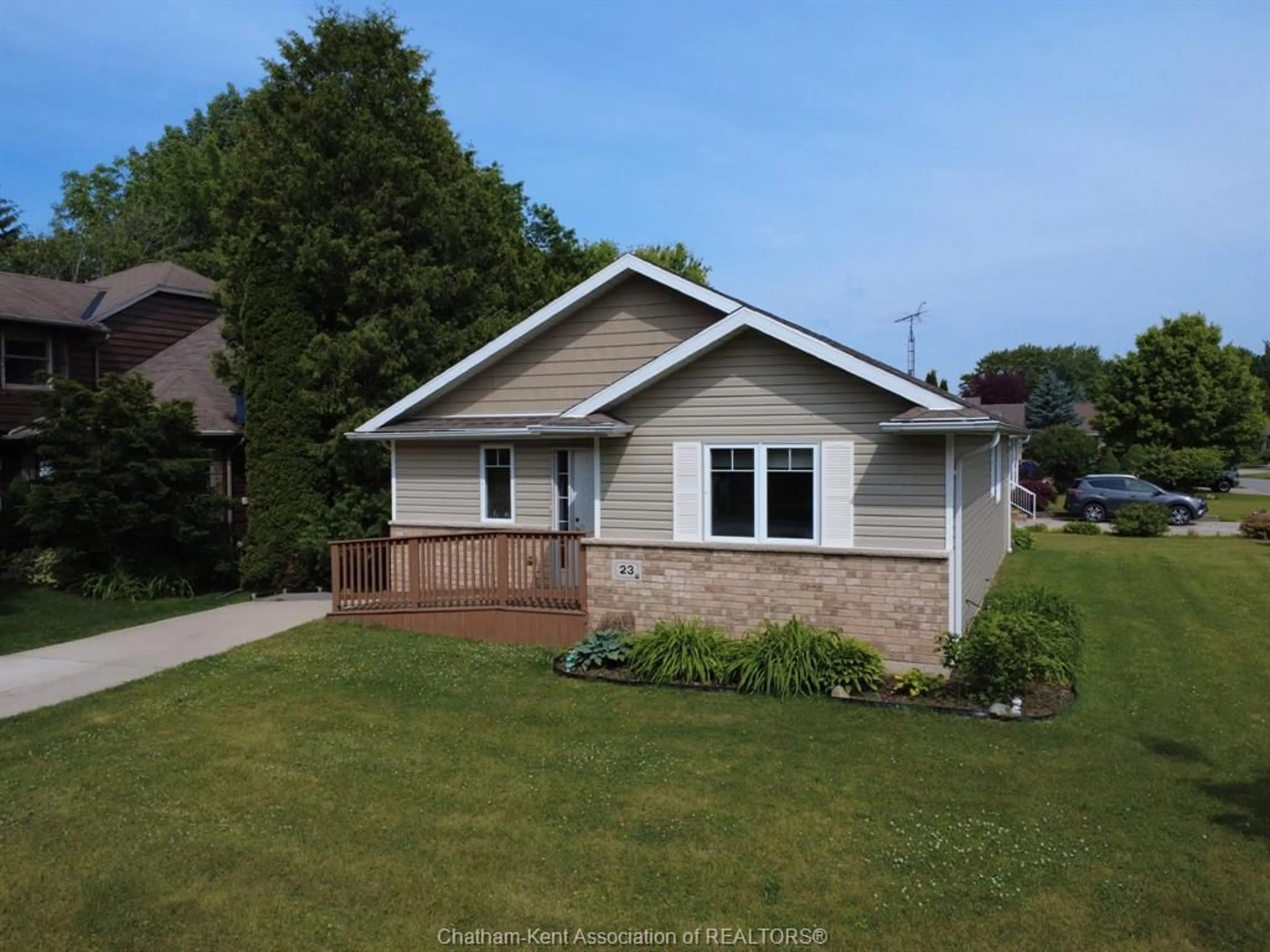 Home with vinyl exterior material, street for 23 Kyle Dr, Ridgetown Ontario N0P 2C0