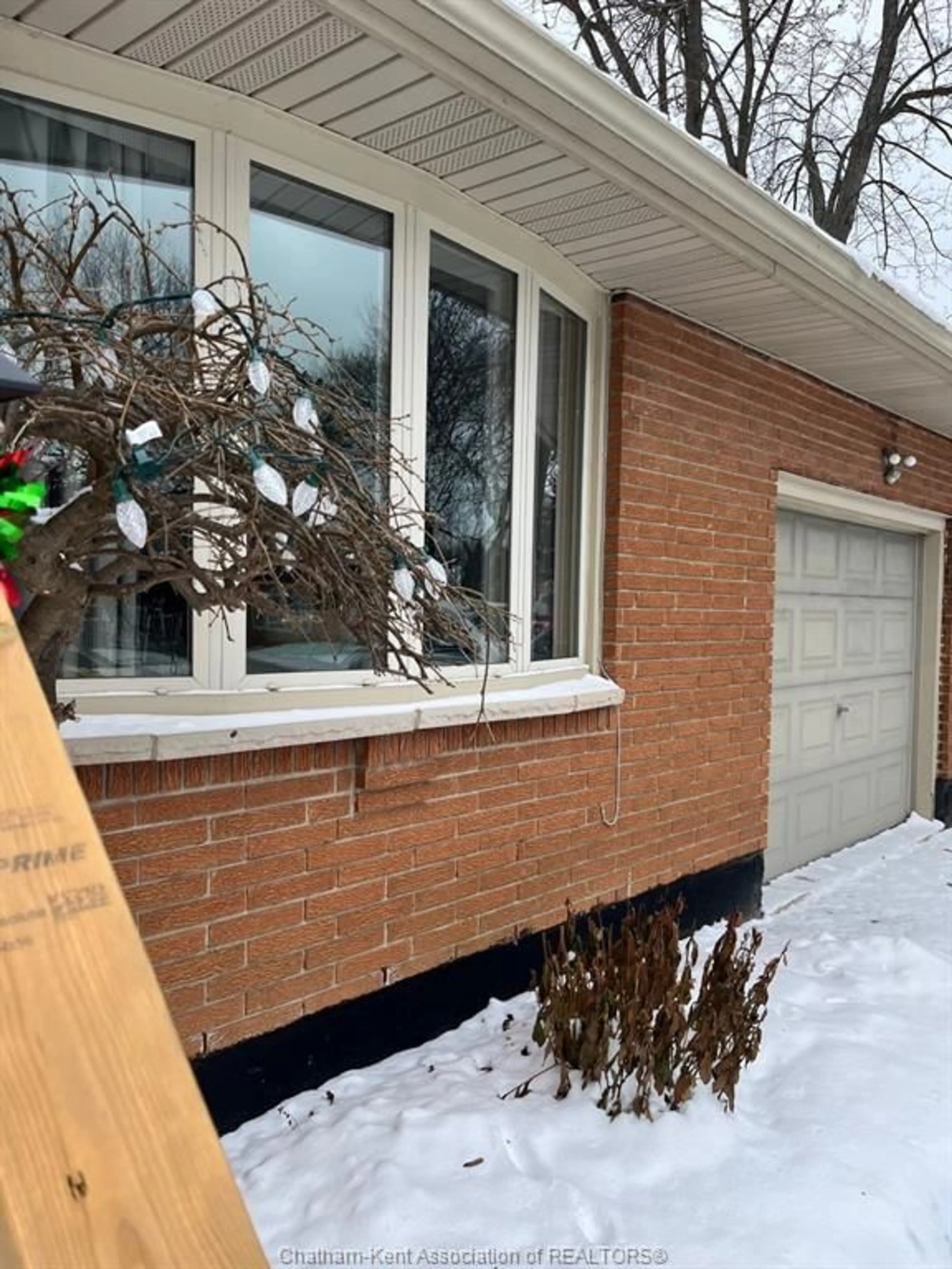 Home with brick exterior material, street for 135 BERRY St, Chatham Ontario N7N 3B2