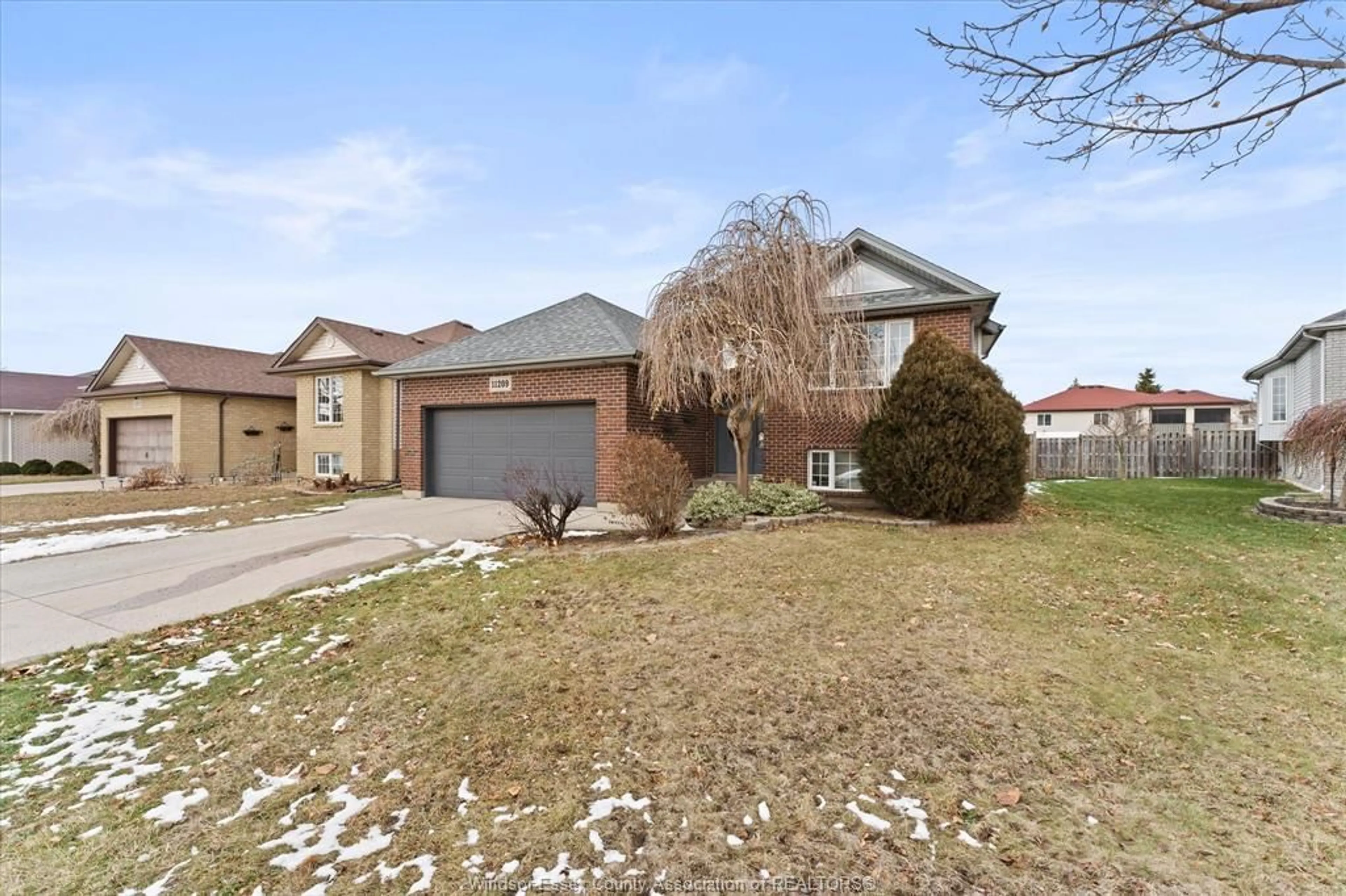 A pic from outside/outdoor area/front of a property/back of a property/a pic from drone, street for 11209 ANCONA Cres, Windsor Ontario N8R 2K2
