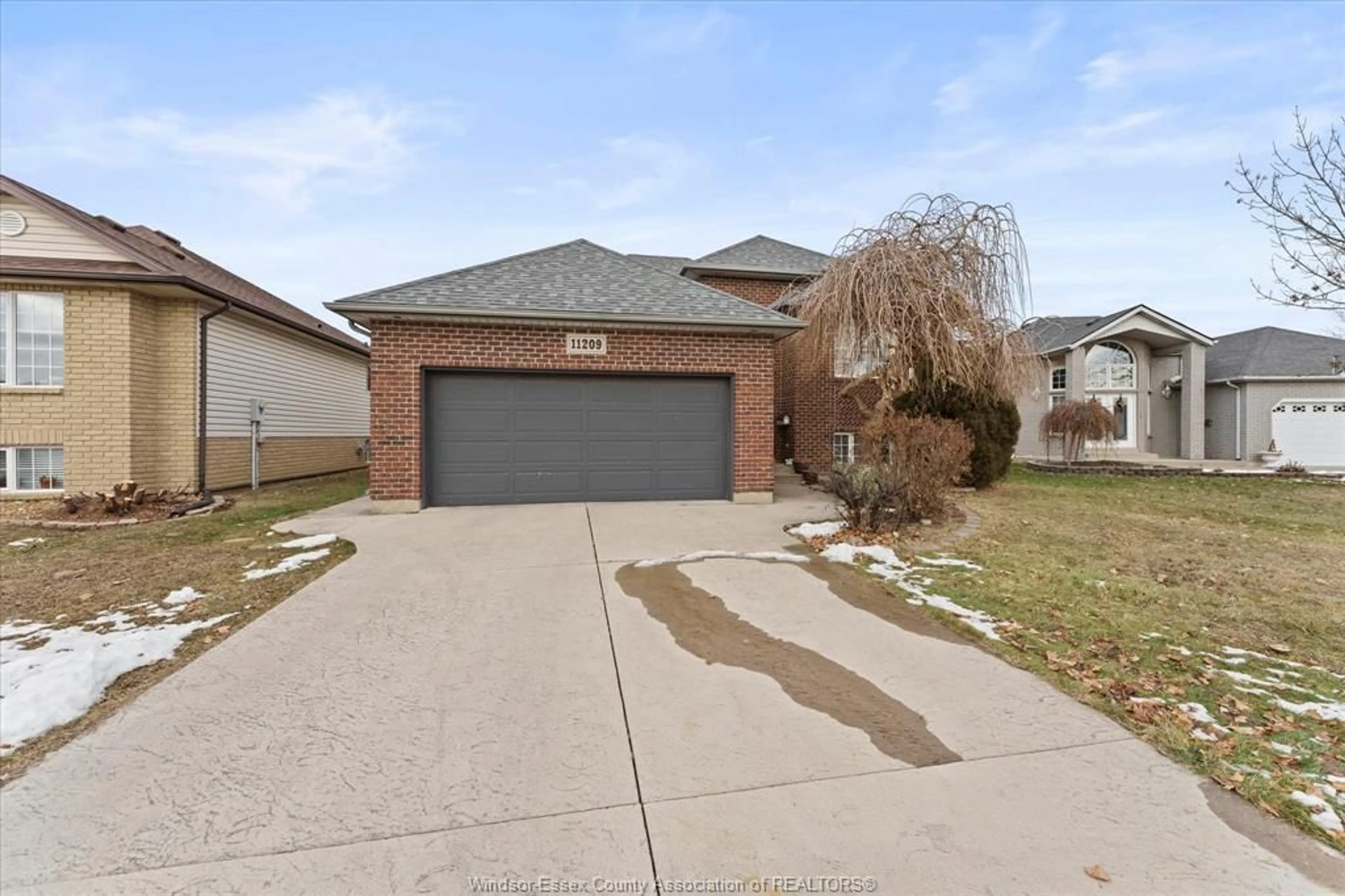 Home with brick exterior material, street for 11209 ANCONA Cres, Windsor Ontario N8R 2K2