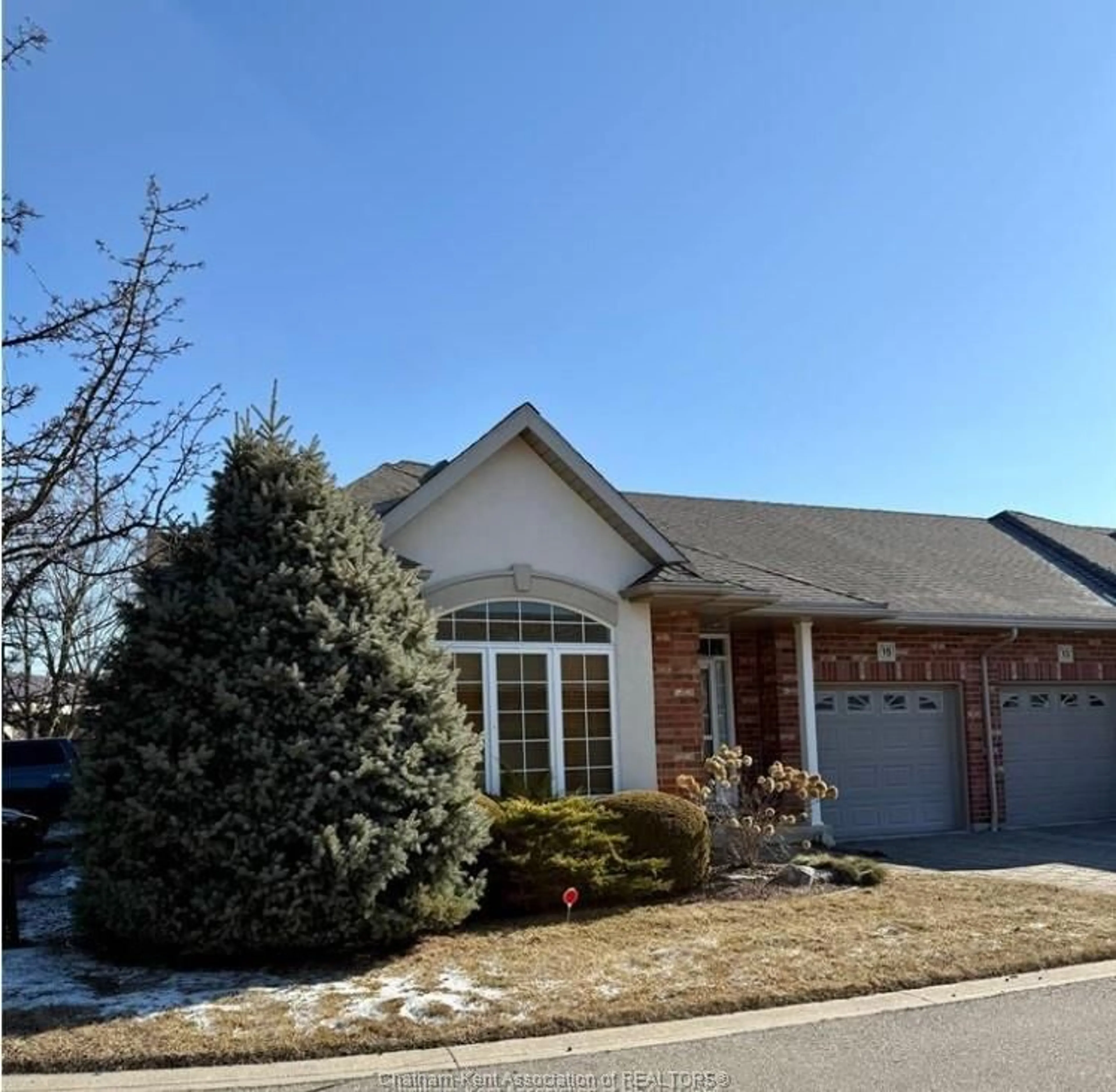 Home with brick exterior material, street for 15 Oakgrove Lane, Chatham Ontario N7L 5R9