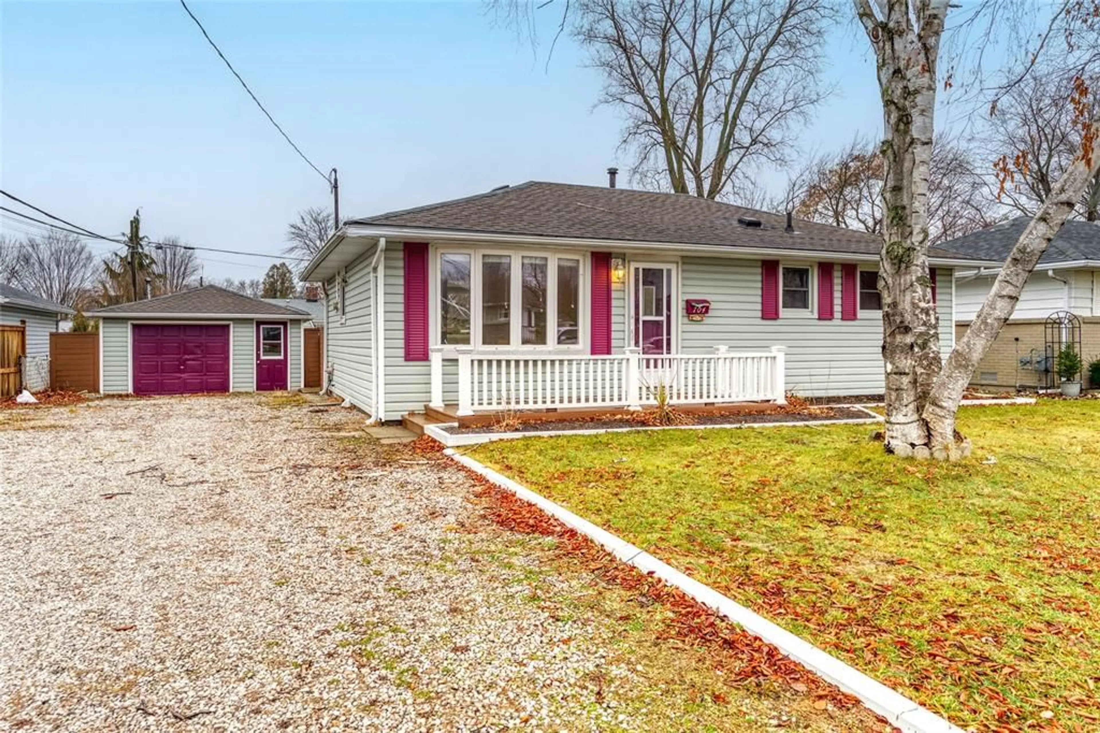 Home with vinyl exterior material, street for 704 HOUSER St, Point Edward Ontario N7V 1A9