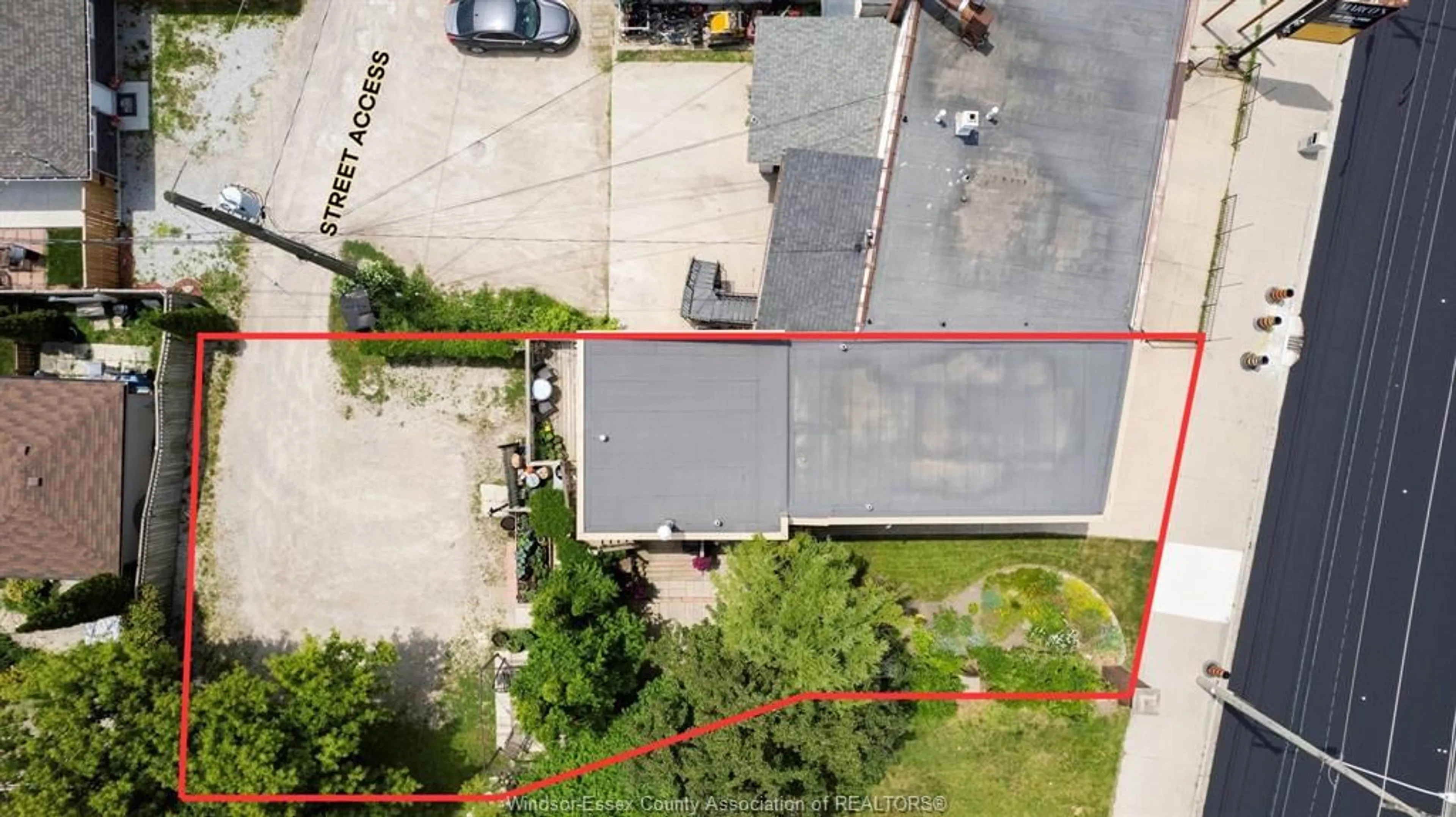 A pic from outside/outdoor area/front of a property/back of a property/a pic from drone, street for 4165 TECUMSEH Rd, Windsor Ontario N8W 1J9