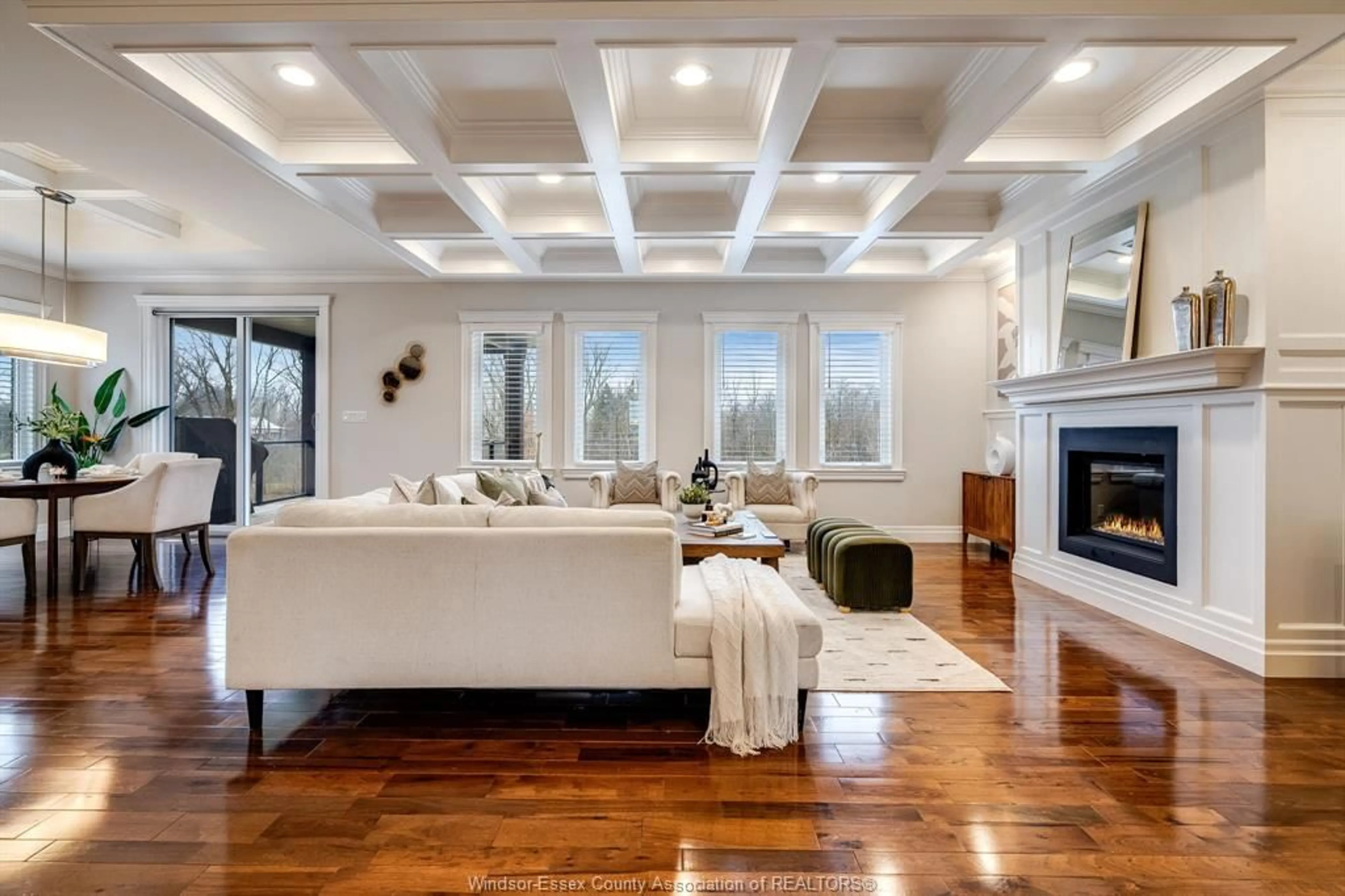 Living room with furniture, wood/laminate floor for 6 Two Creeks, Wheatley Ontario N0P 2P0