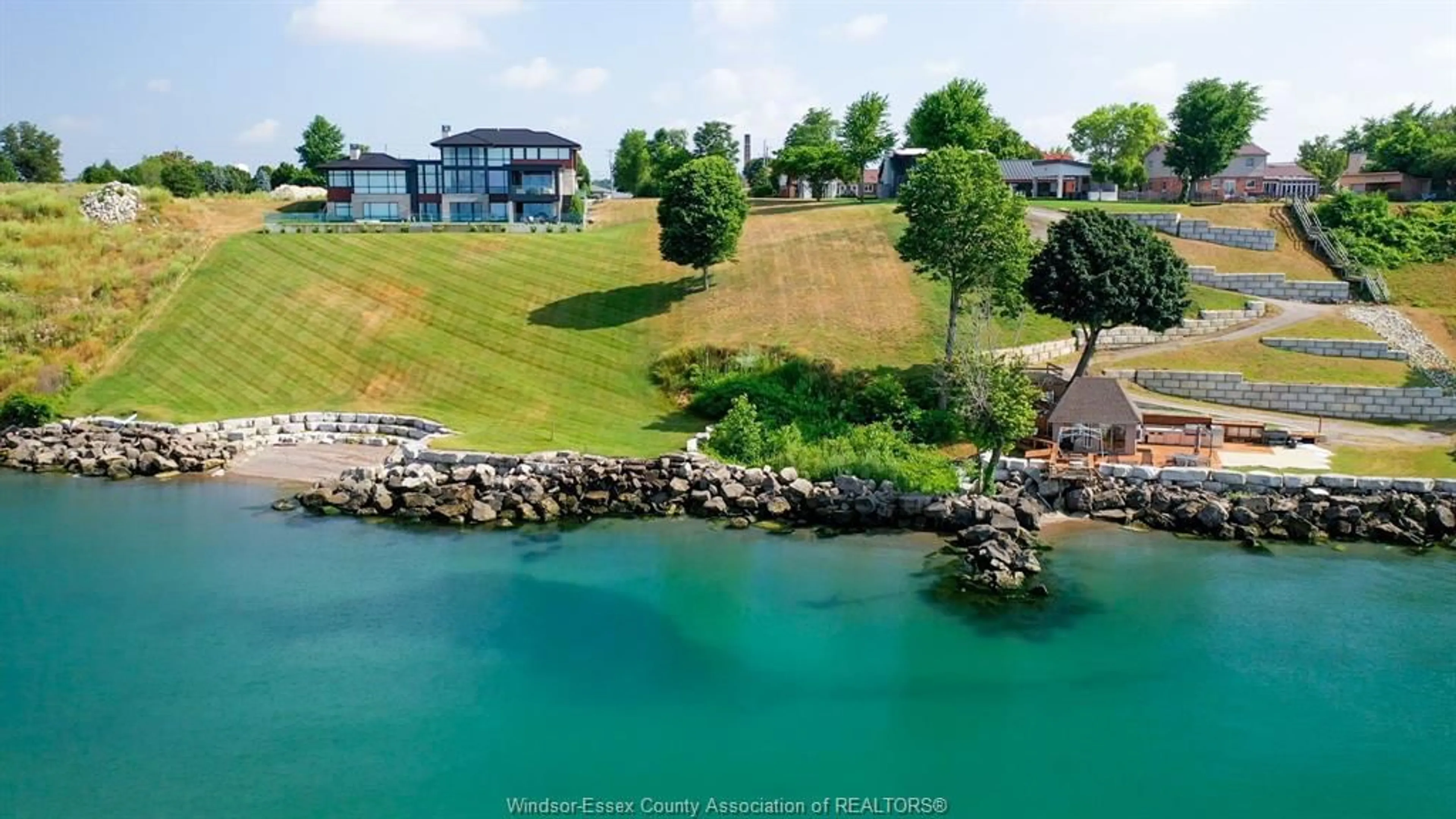 A pic from outside/outdoor area/front of a property/back of a property/a pic from drone, water/lake/river/ocean view for 366 SEACLIFF Dr, Leamington Ontario N8H 4E1