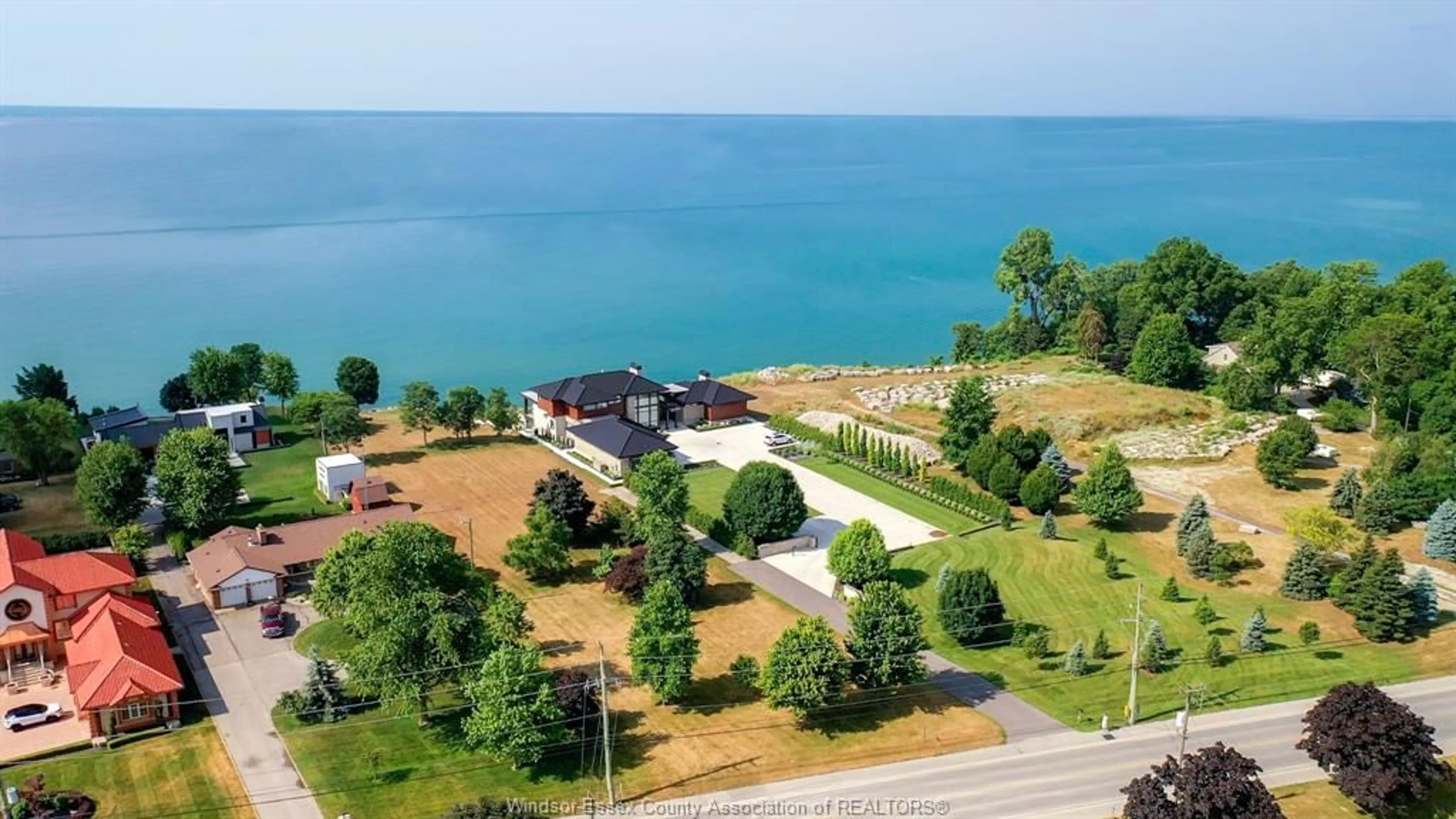 A pic from outside/outdoor area/front of a property/back of a property/a pic from drone, water/lake/river/ocean view for 366 SEACLIFF Dr, Leamington Ontario N8H 4E1