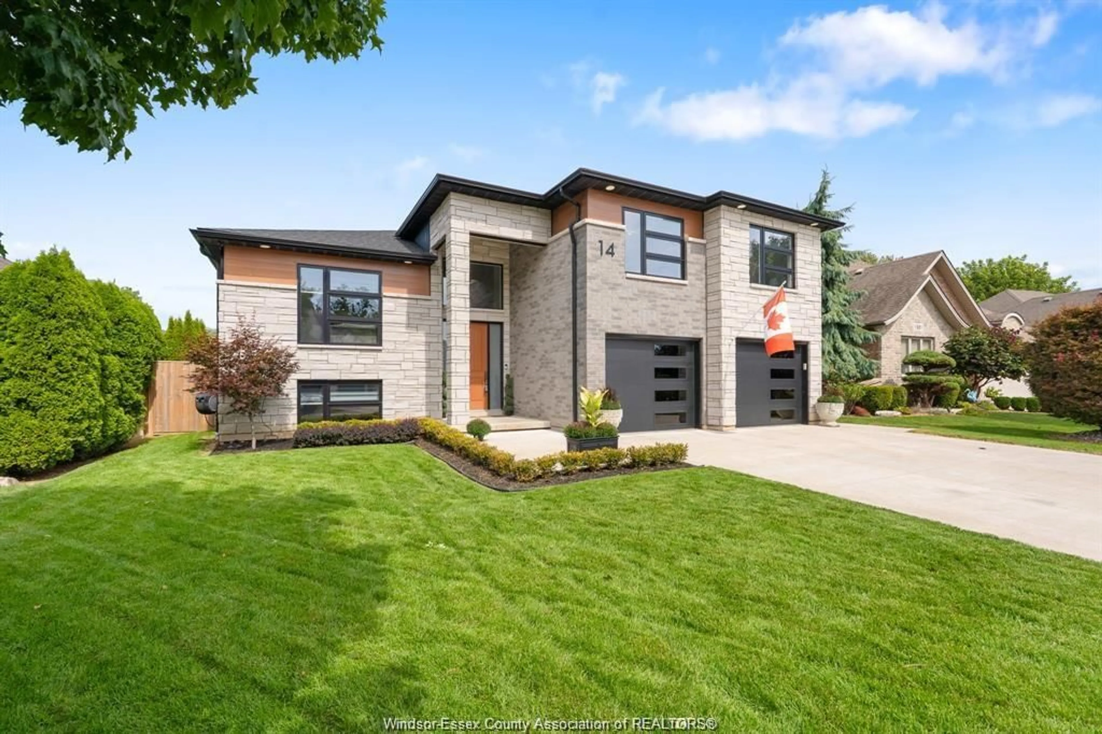 Home with brick exterior material, street for 14 PRIMROSE Dr, Kingsville Ontario N9Y 0A3