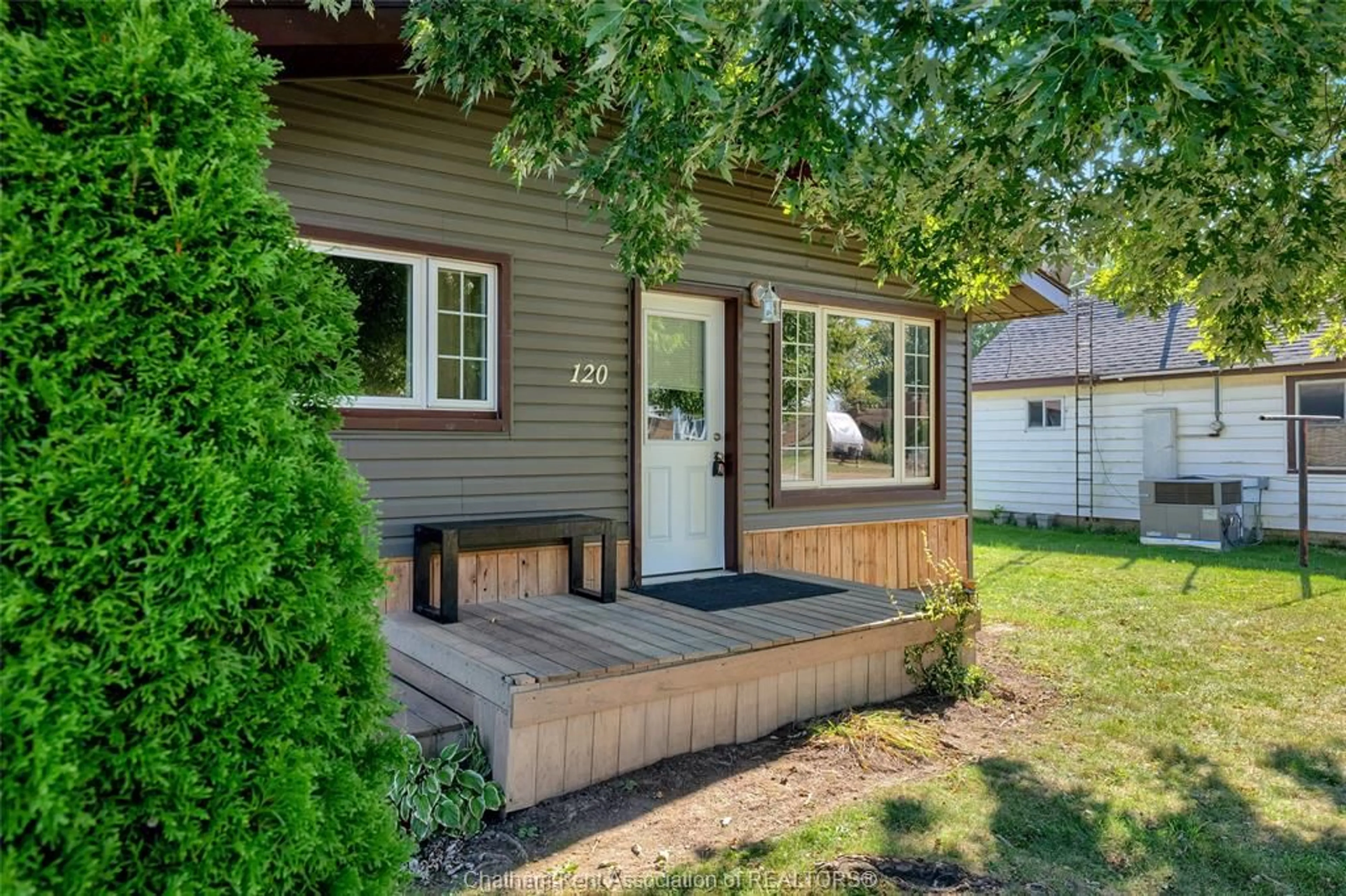 Home with vinyl exterior material, street for 120 Water St, Wallaceburg Ontario N8A 2G2