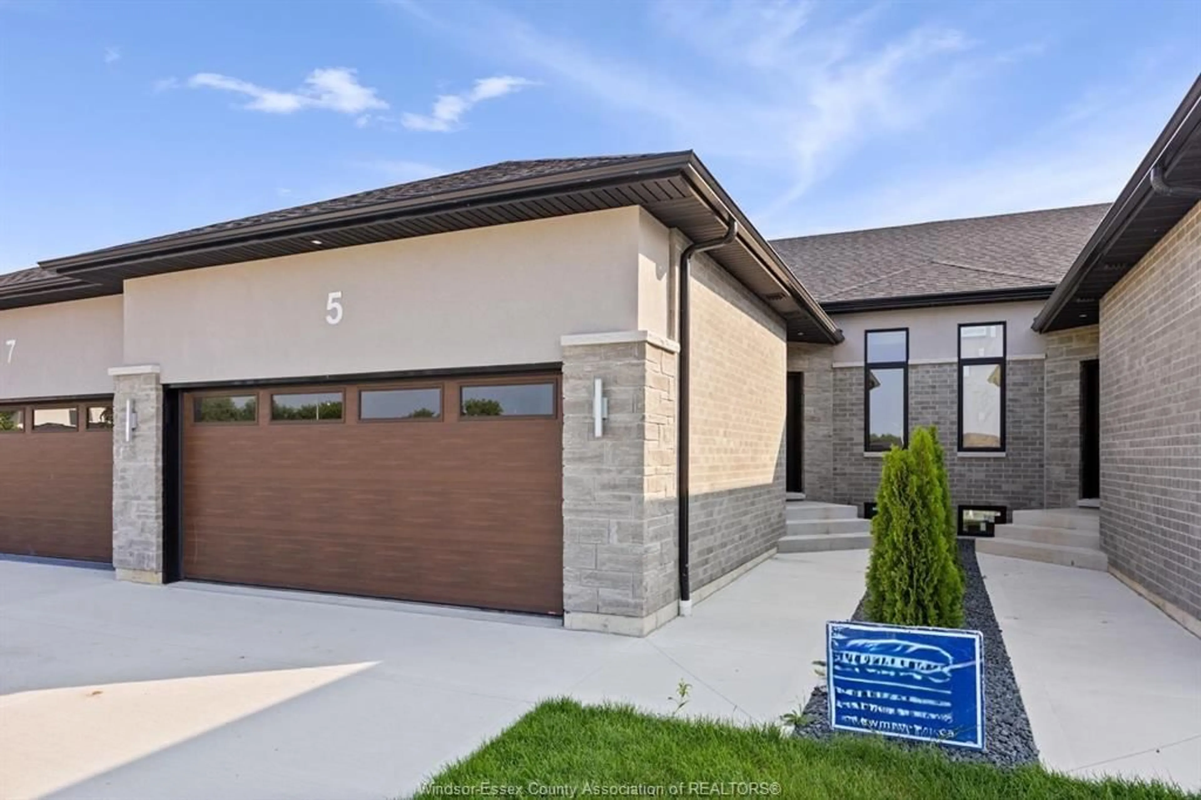 Home with brick exterior material, street for 5 EAGLE St, Leamington Ontario N8H 0E1