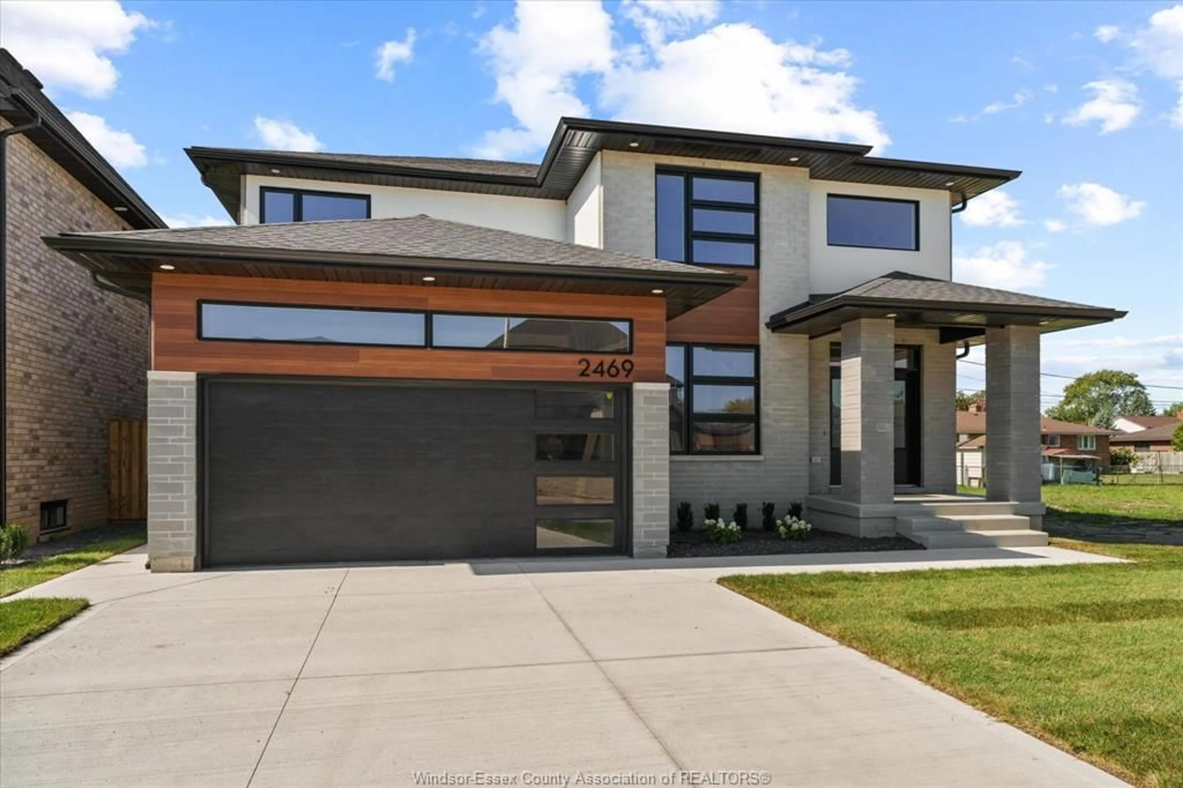 Home with brick exterior material, street for 2469 PARTINGTON Ave, Windsor Ontario N9E 0A9