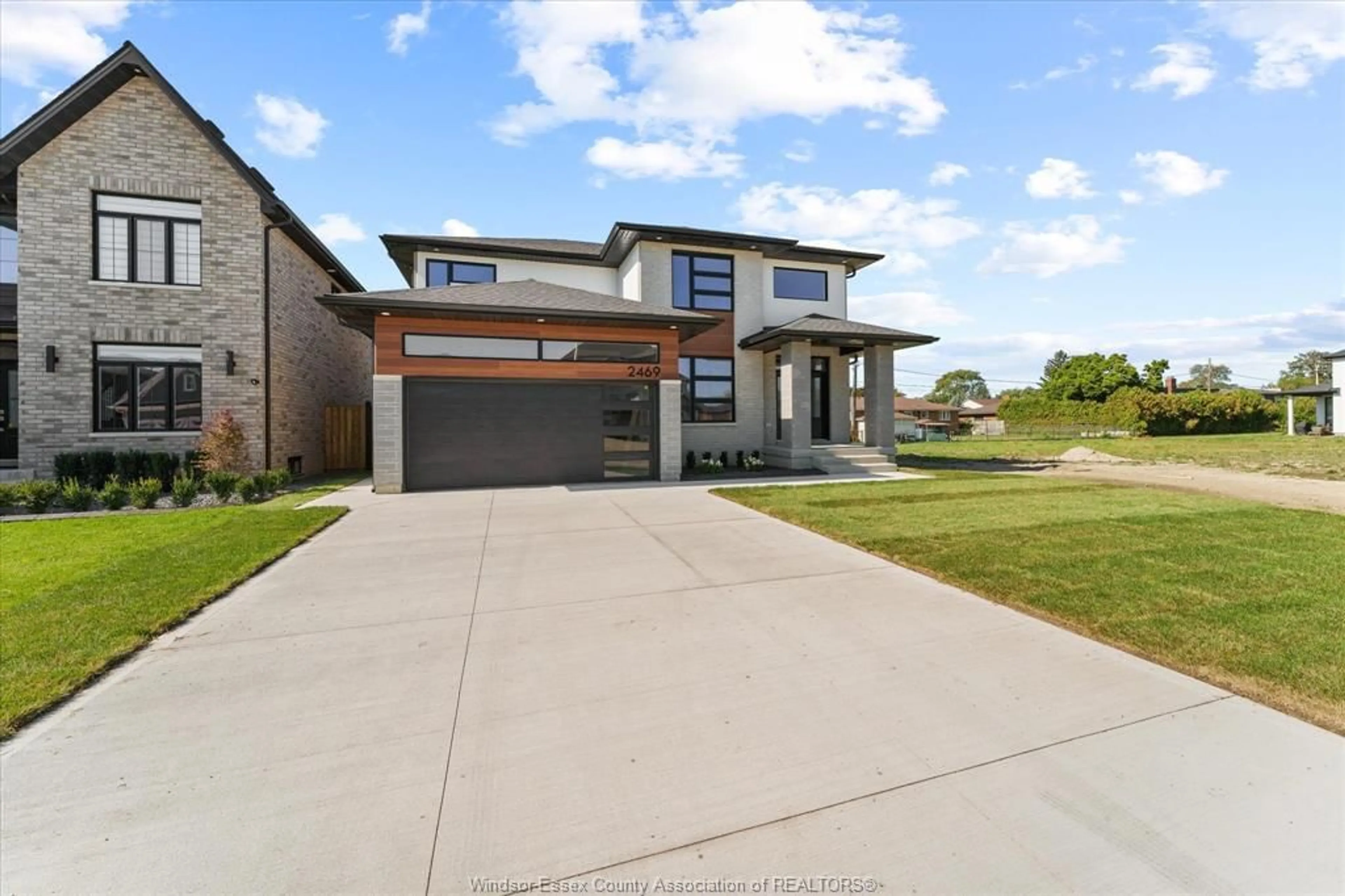 Home with brick exterior material, street for 2469 PARTINGTON Ave, Windsor Ontario N9E 0A9