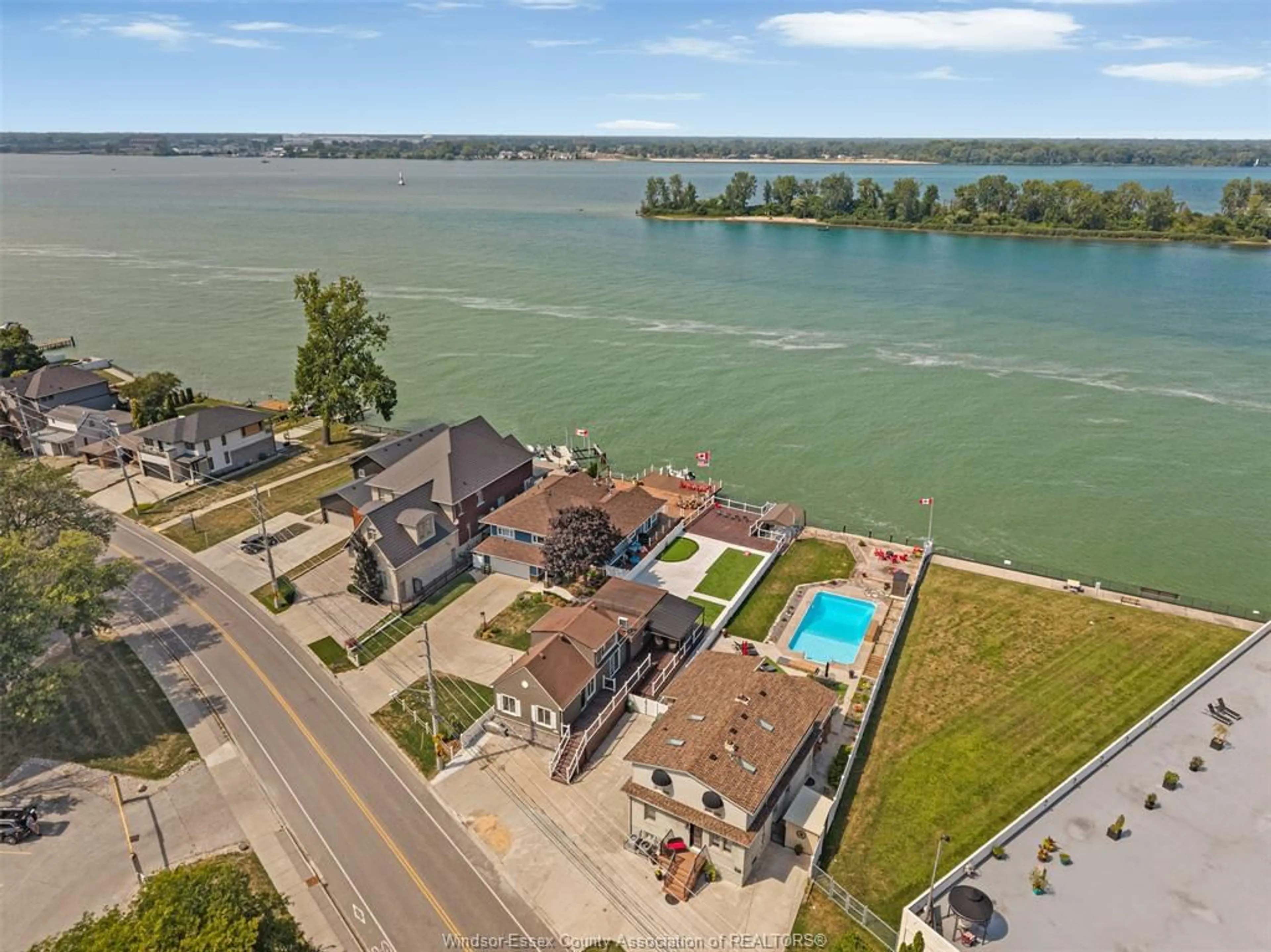 A pic from outside/outdoor area/front of a property/back of a property/a pic from drone, water/lake/river/ocean view for 8830 RIVERSIDE Dr, Windsor Ontario N8S 1G7