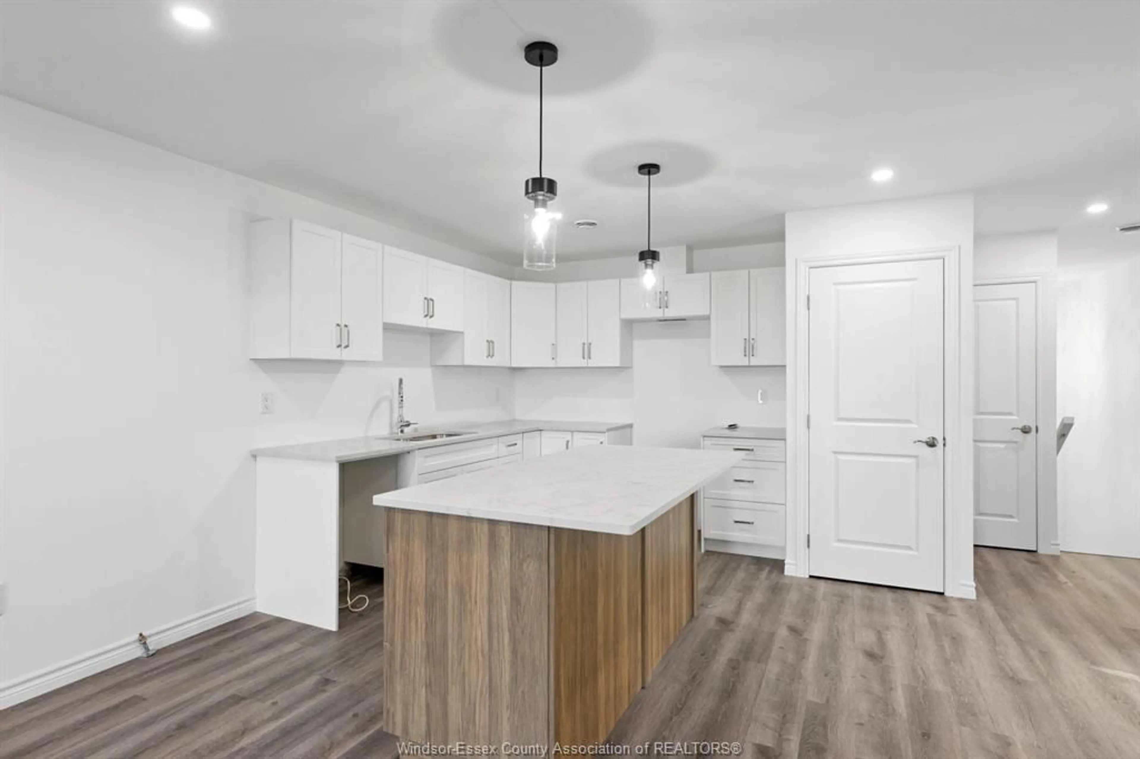 Open concept kitchen, wood/laminate floor for 98 ERIE St, Ridgetown Ontario N0P 2C0