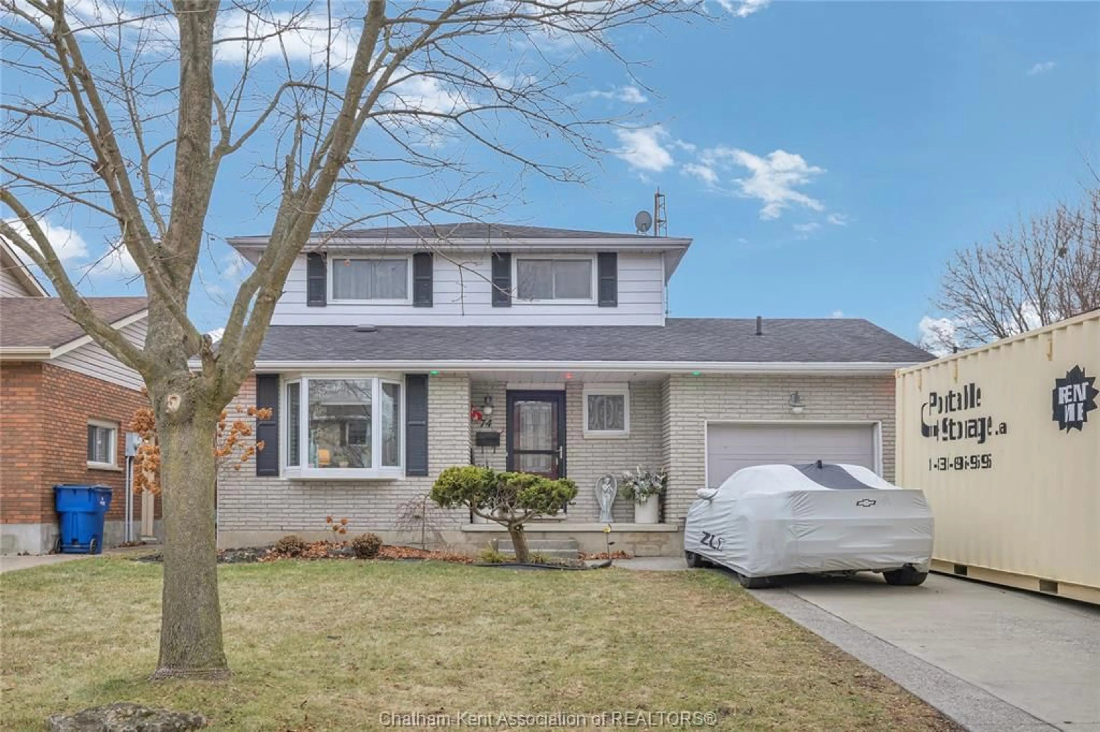 Home with vinyl exterior material, street for 74 Bruinsma Ave, Chatham Ontario N7M 6C3