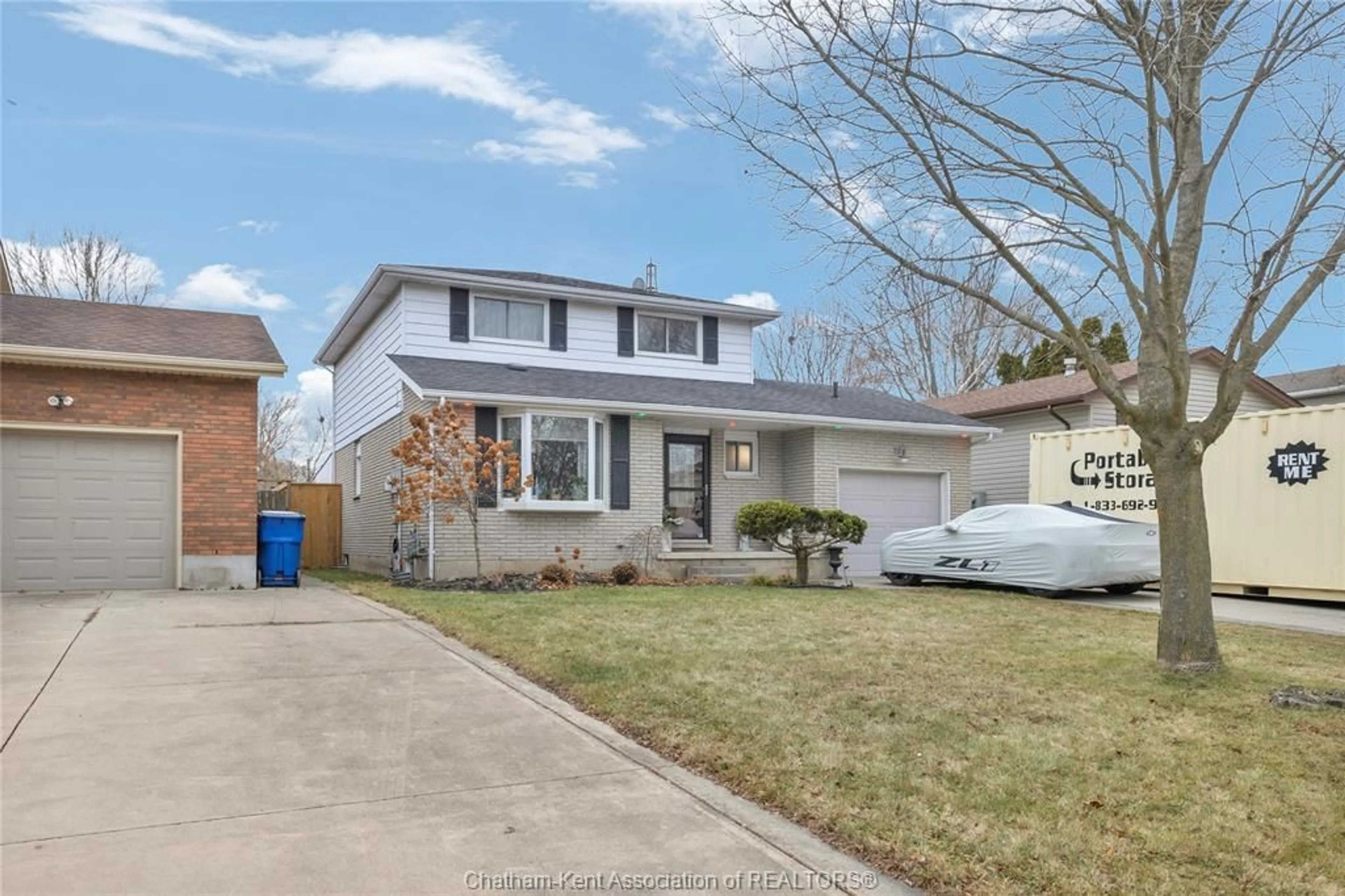 Home with vinyl exterior material, street for 74 Bruinsma Ave, Chatham Ontario N7M 6C3