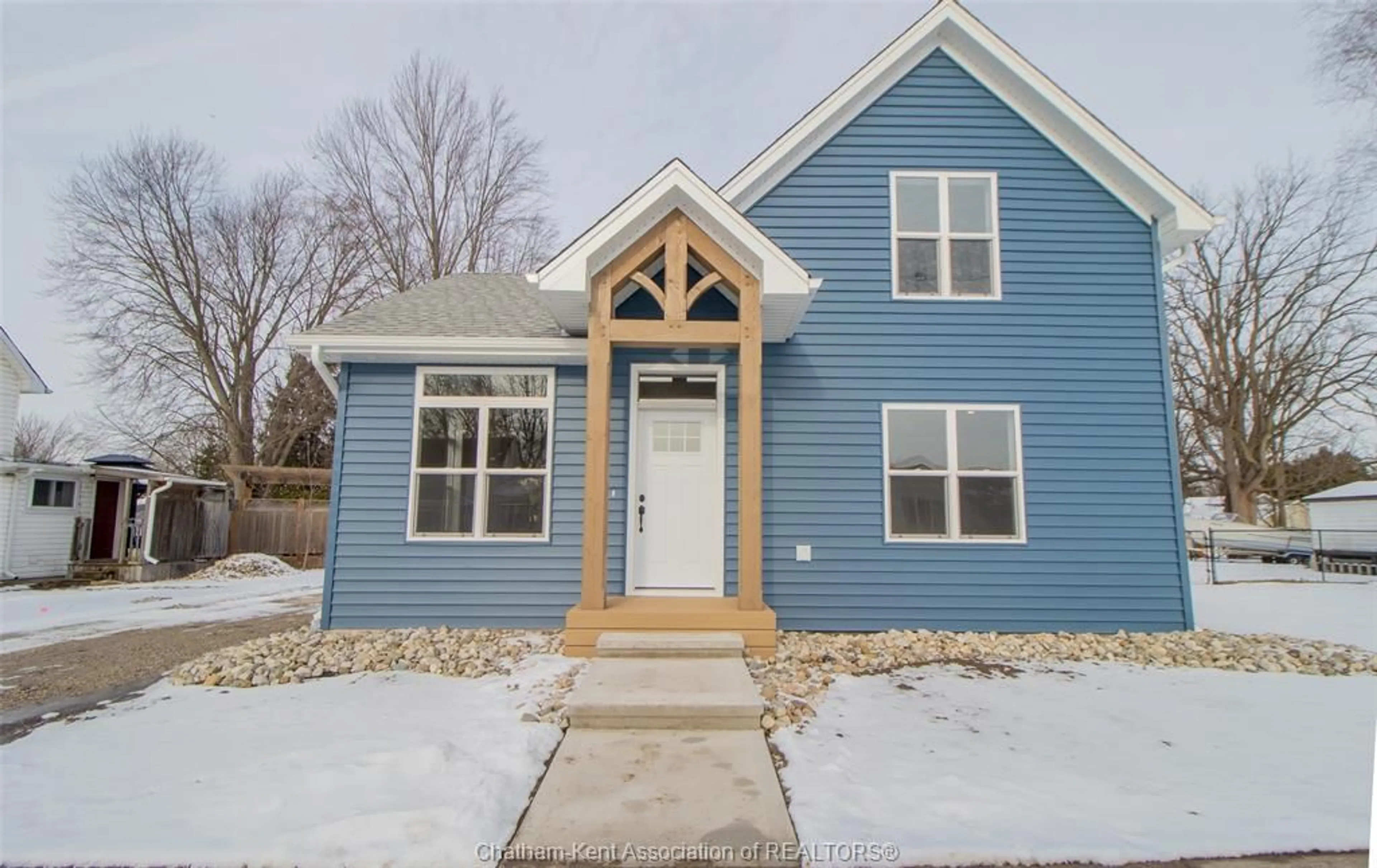 Home with vinyl exterior material, street for 454 Trerice St, Dresden Ontario N0P 1M0