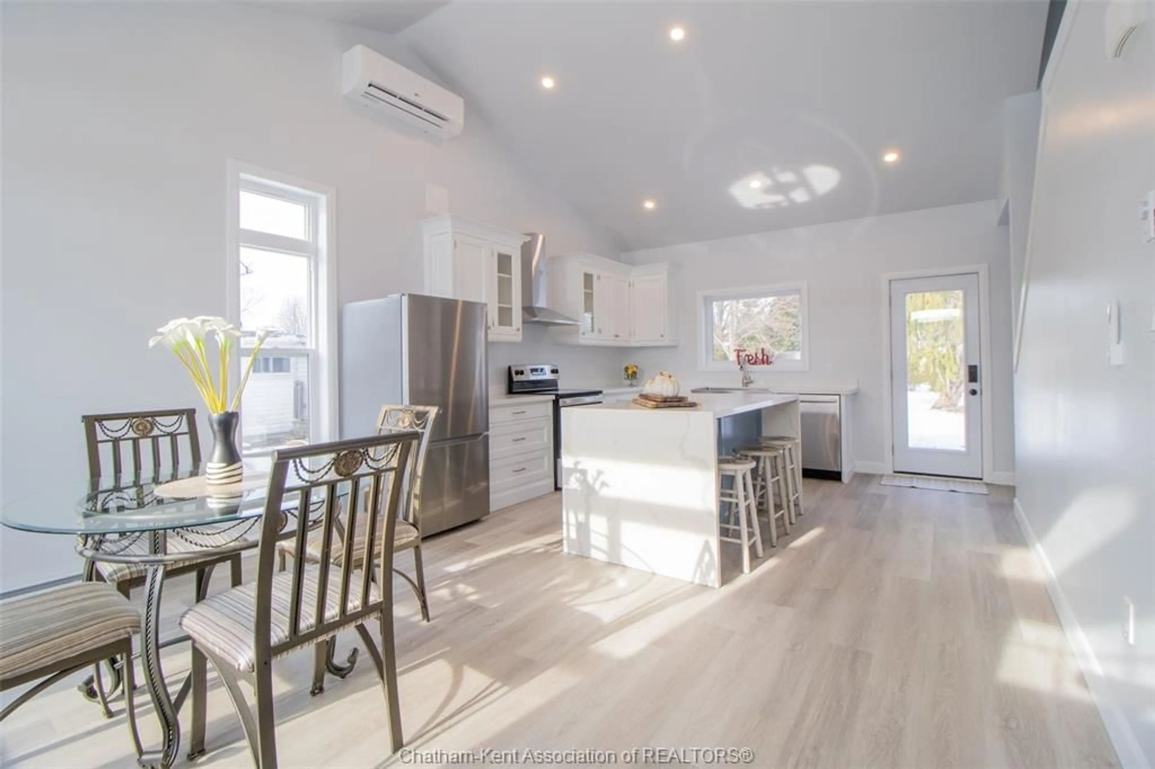 Open concept kitchen, wood/laminate floor for 454 Trerice St, Dresden Ontario N0P 1M0