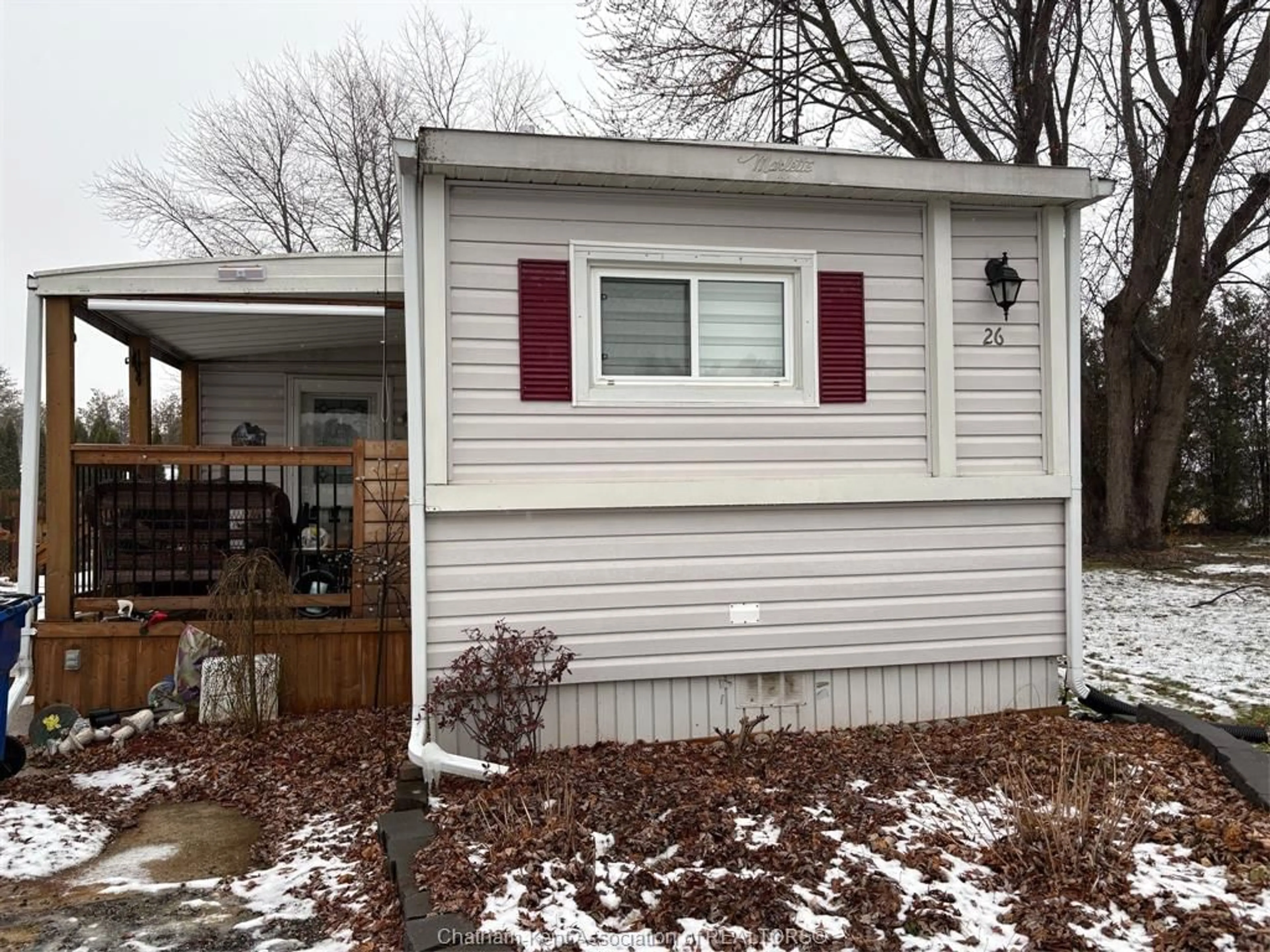 Home with vinyl exterior material, street for 22220 Charing Cross Rd, Chatham Ontario N7M 5V8