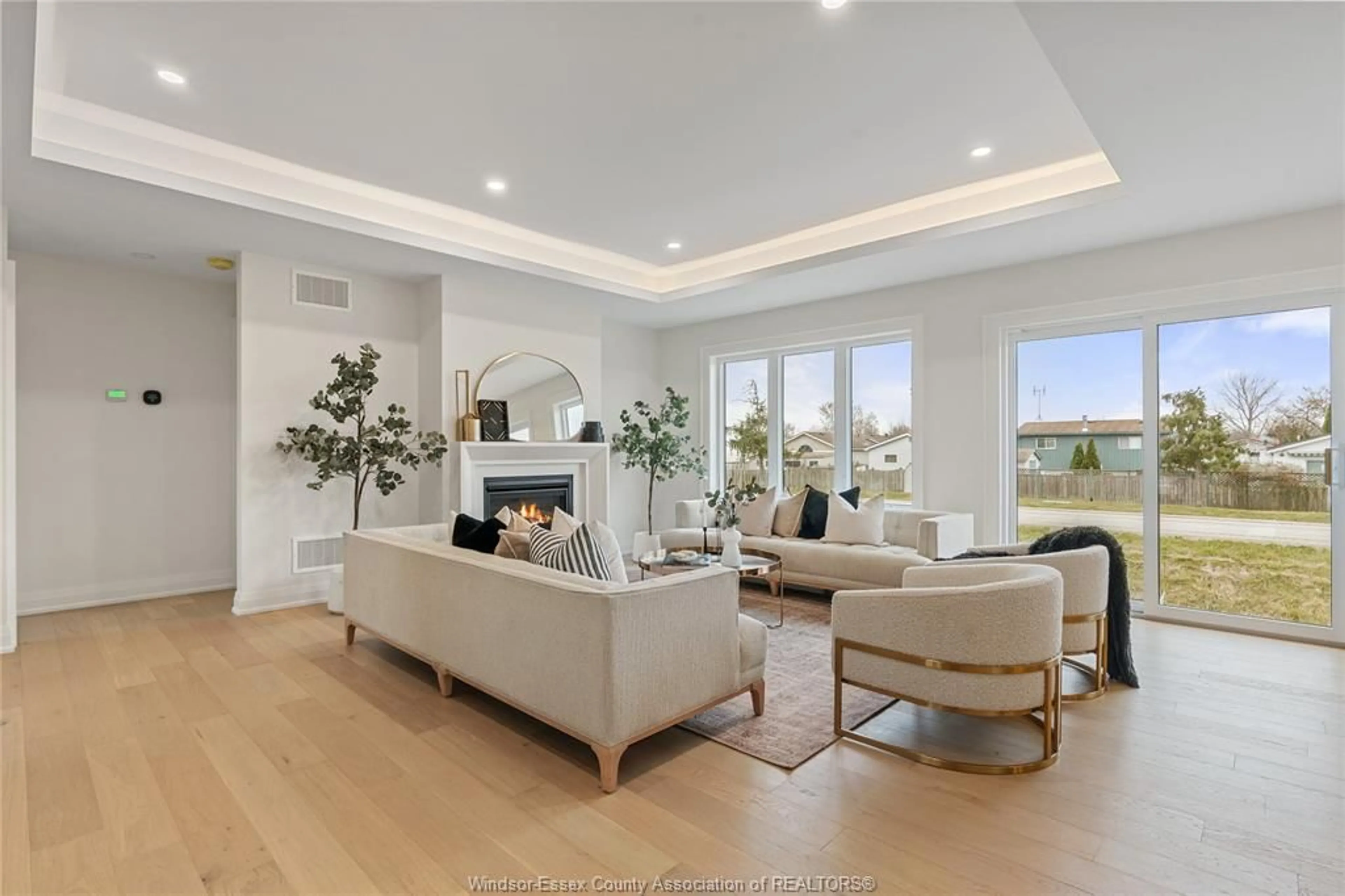 Living room with furniture, wood/laminate floor for 12181 DUCHARME, Essex Ontario N0R 1J0