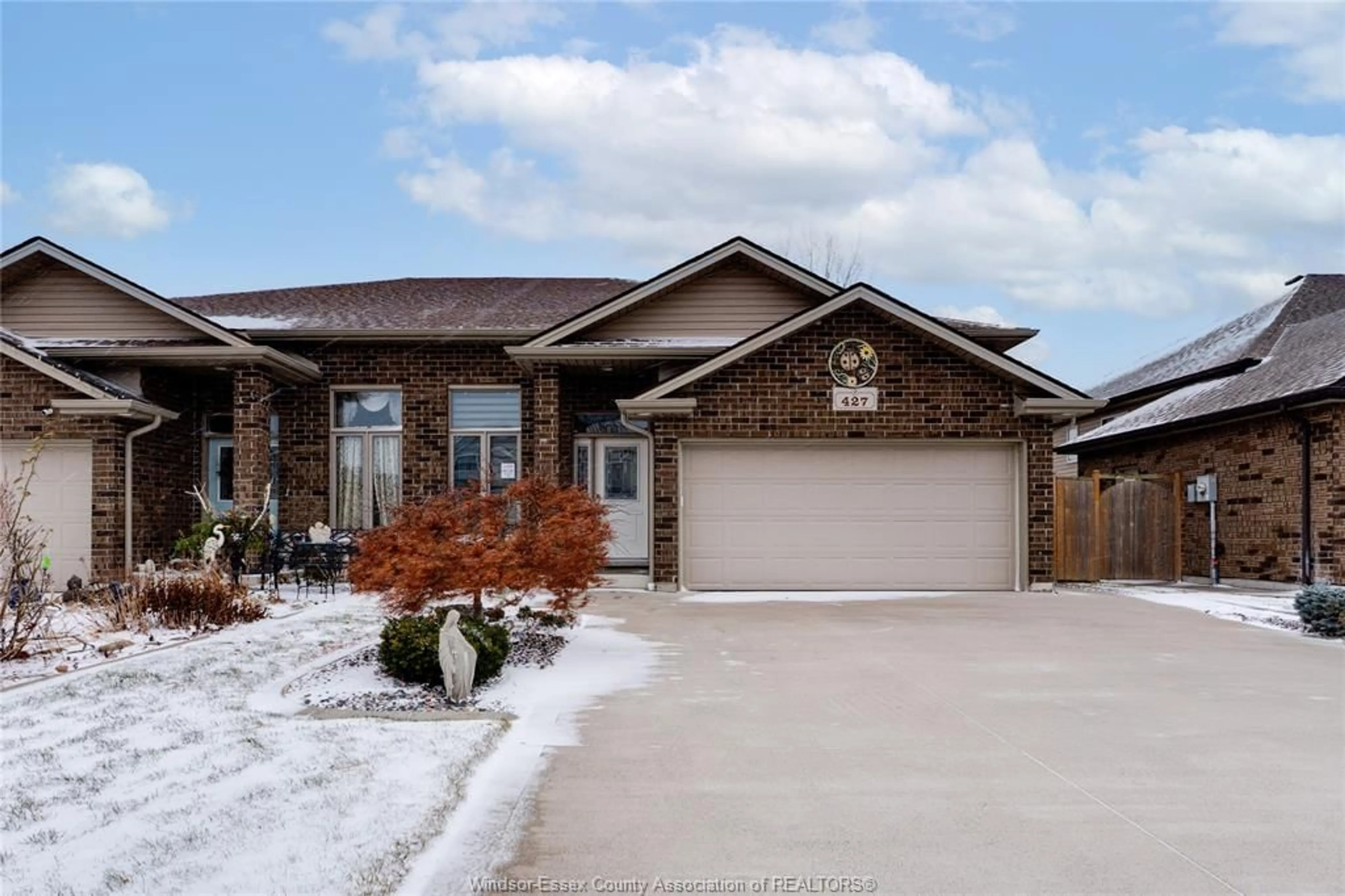 Home with brick exterior material, street for 427 ROSEWOOD Dr, Lakeshore Ontario N8L 1B9