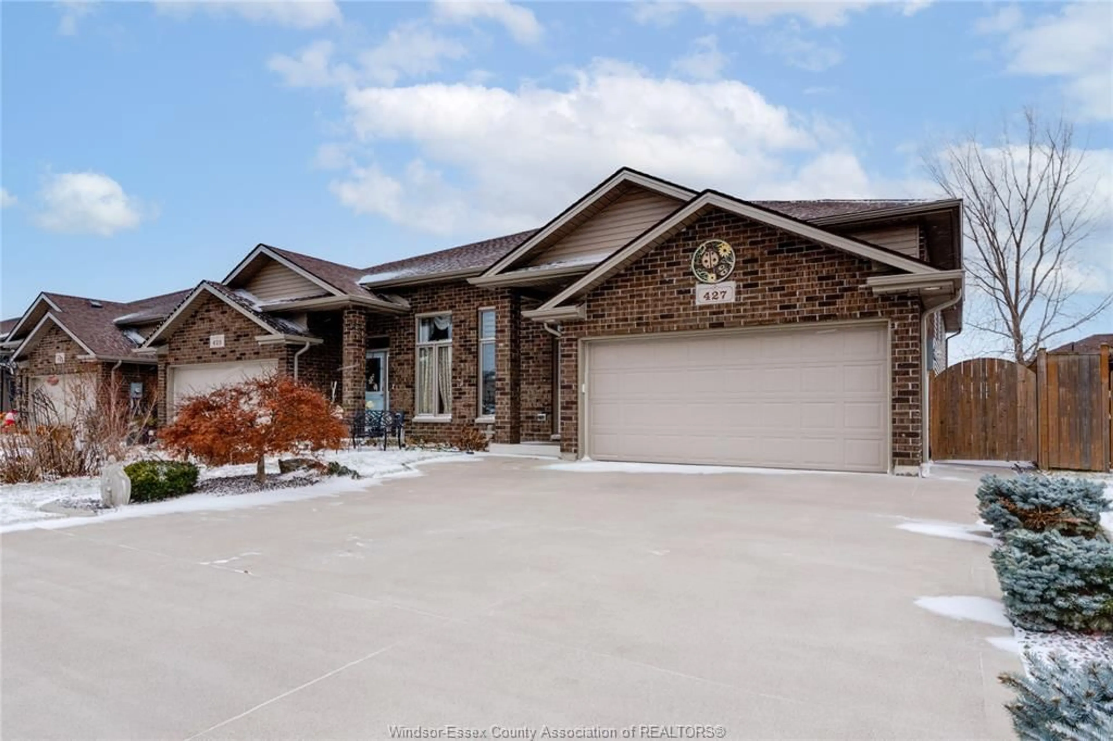 Home with brick exterior material, street for 427 ROSEWOOD Dr, Lakeshore Ontario N8L 1B9