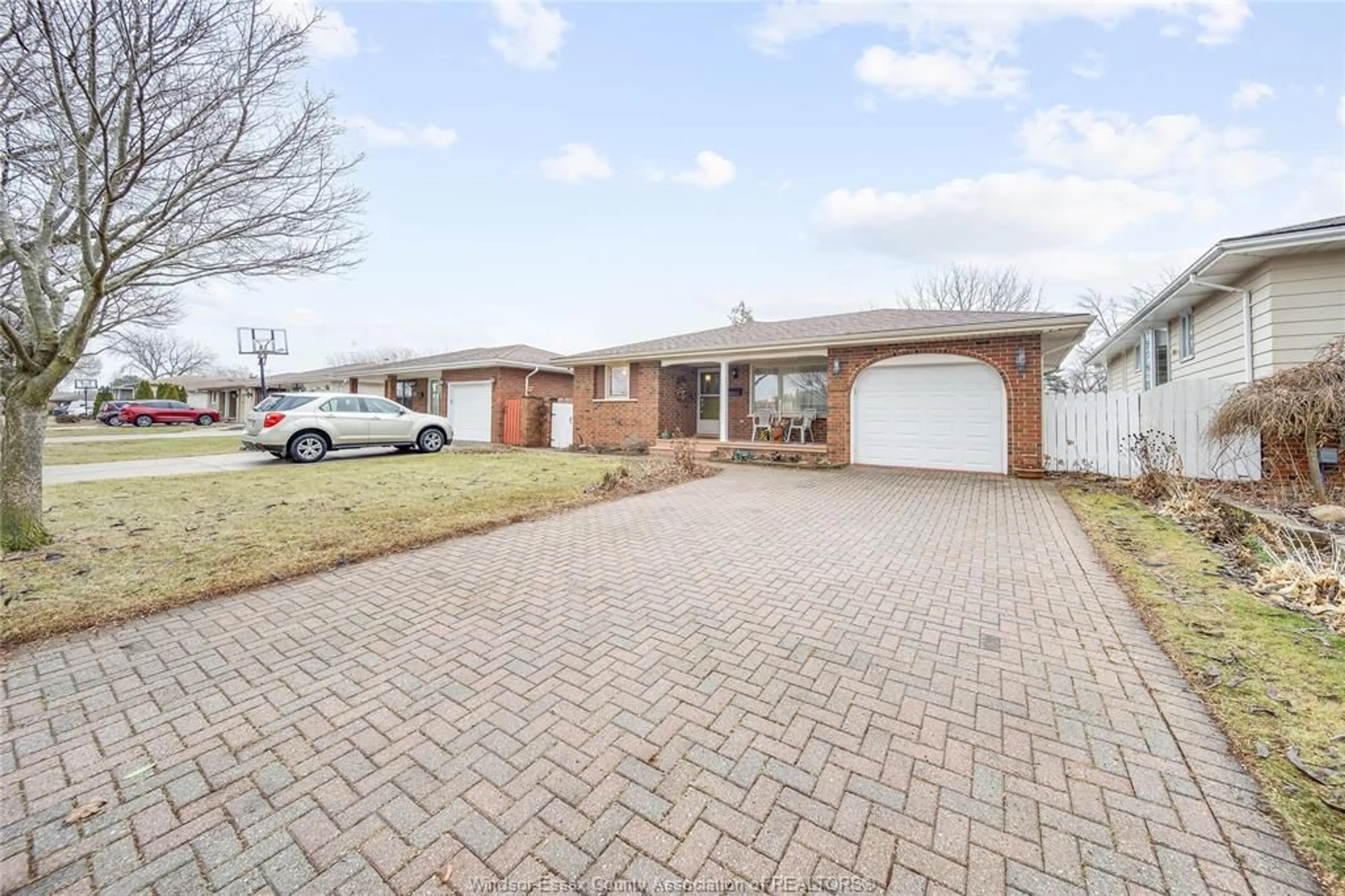 Home with brick exterior material, street for 10682 KEATING Cres, Windsor Ontario N8R 1T5