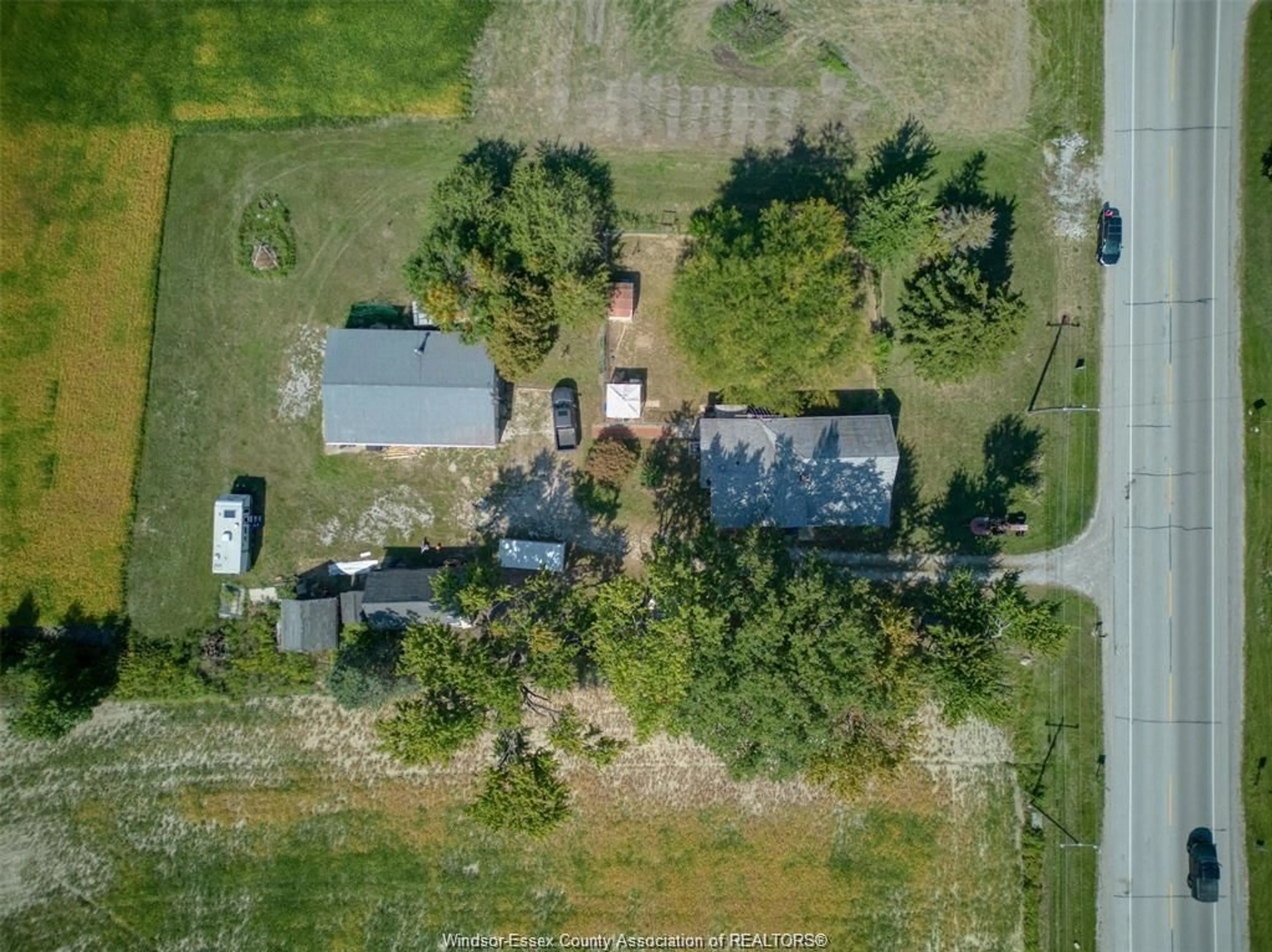 A pic from outside/outdoor area/front of a property/back of a property/a pic from drone, street for 3119 DIVISION Rd, Kingsville Ontario N0R 1B0