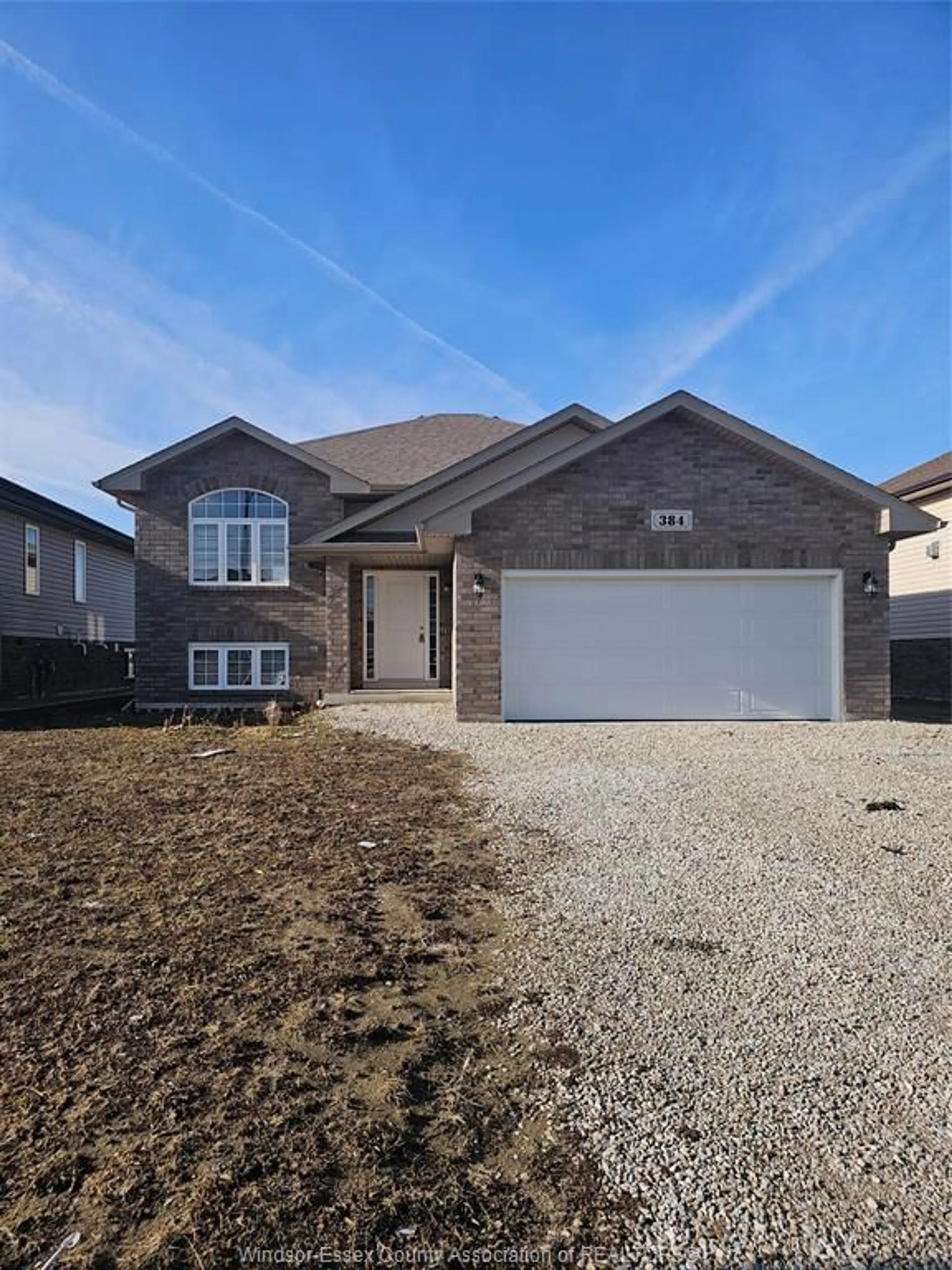 Home with brick exterior material, street for 384 Hemlock Lane Lane, Belle River Ontario N0R 1A0