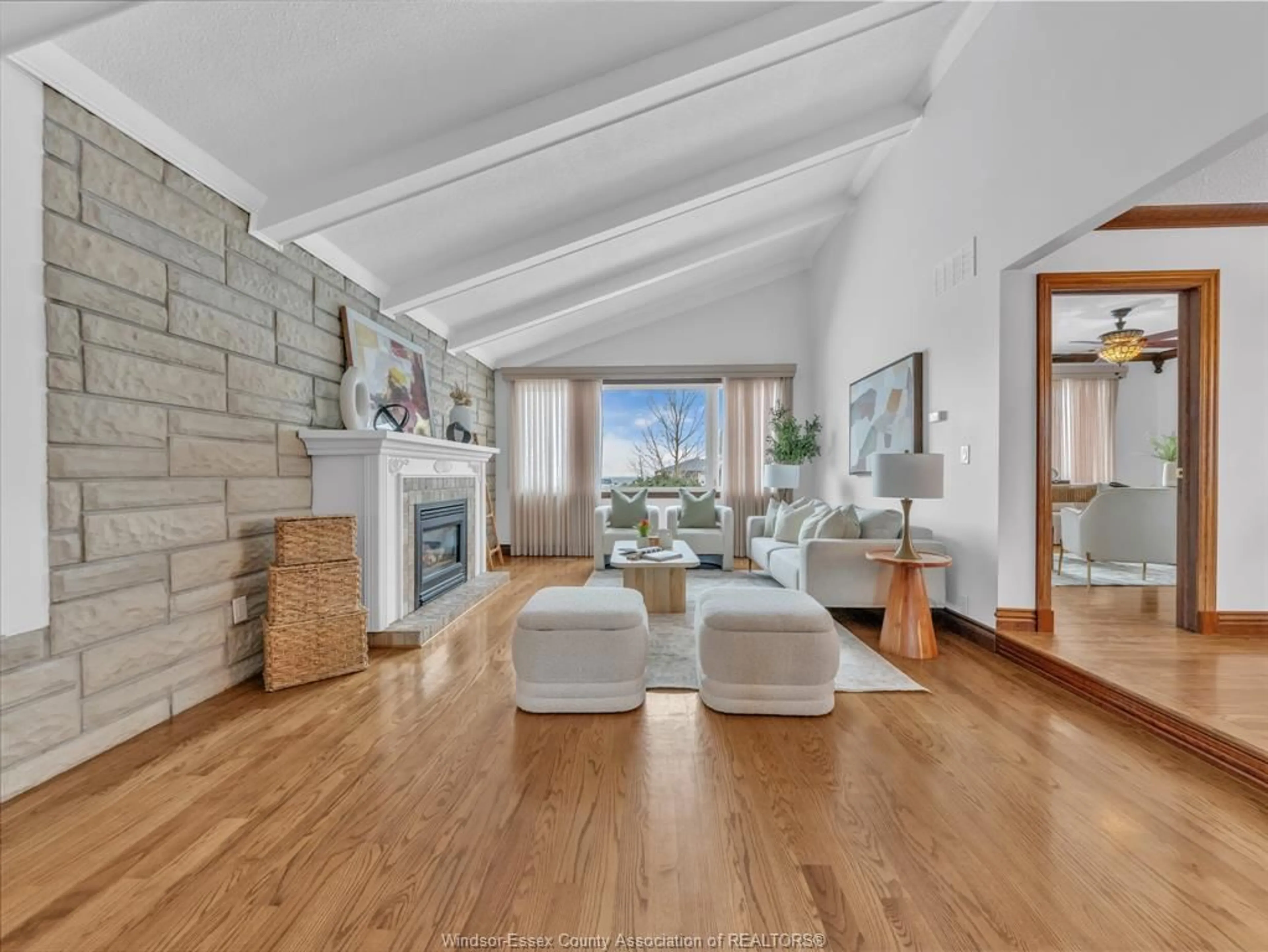 Living room with furniture, wood/laminate floor for 3 Beth Cres, Leamington Ontario N8H 3Z8