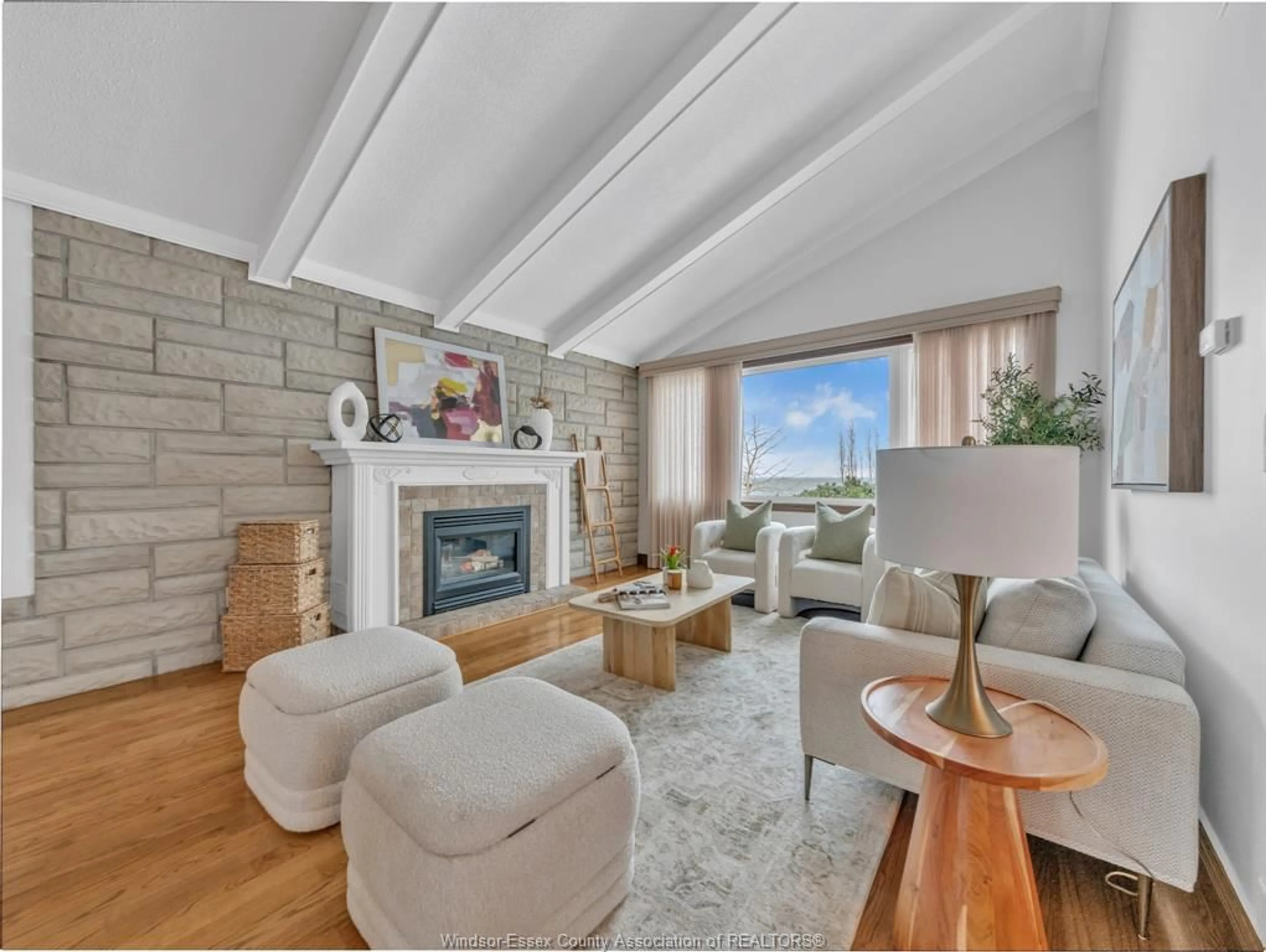 Living room with furniture, wood/laminate floor for 3 Beth Cres, Leamington Ontario N8H 3Z8