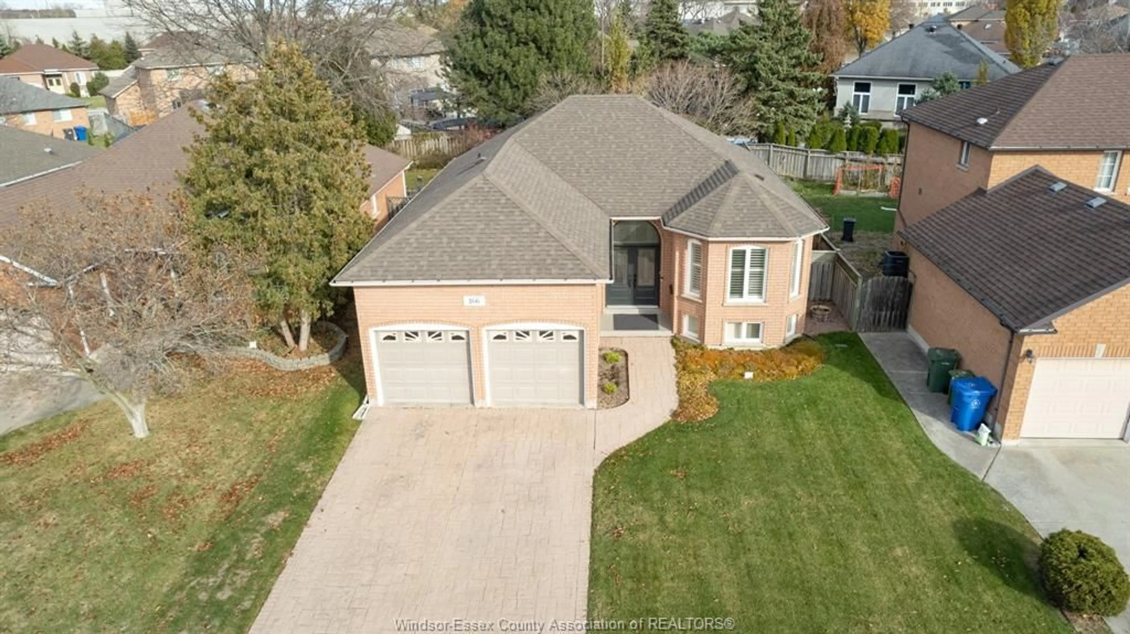 A pic from outside/outdoor area/front of a property/back of a property/a pic from drone, street for 166 EVELEIGH Cres, Windsor Ontario N9E 4M2