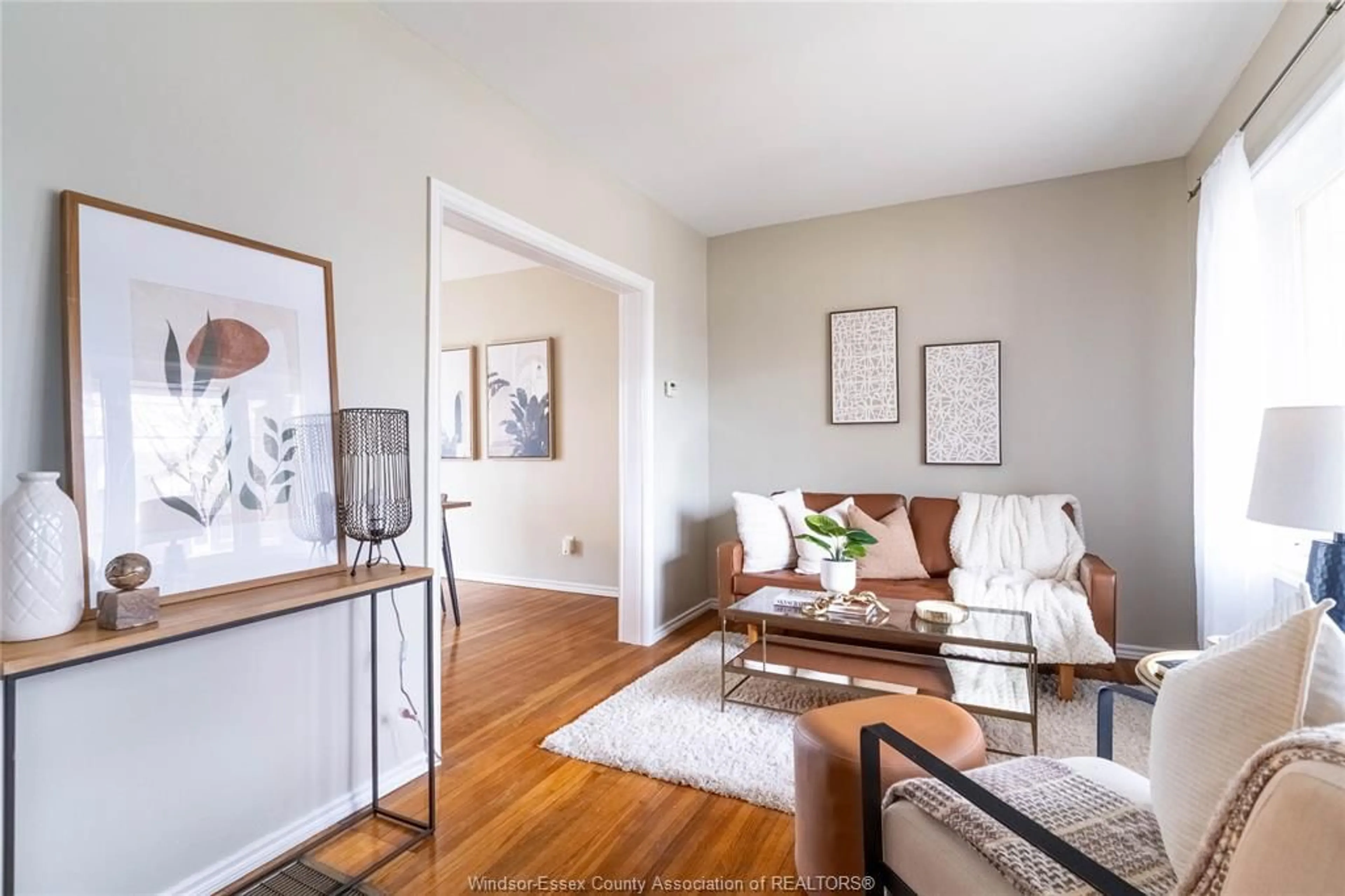Living room with furniture, wood/laminate floor for 1161 Elm, Windsor Ontario N9A 3J1
