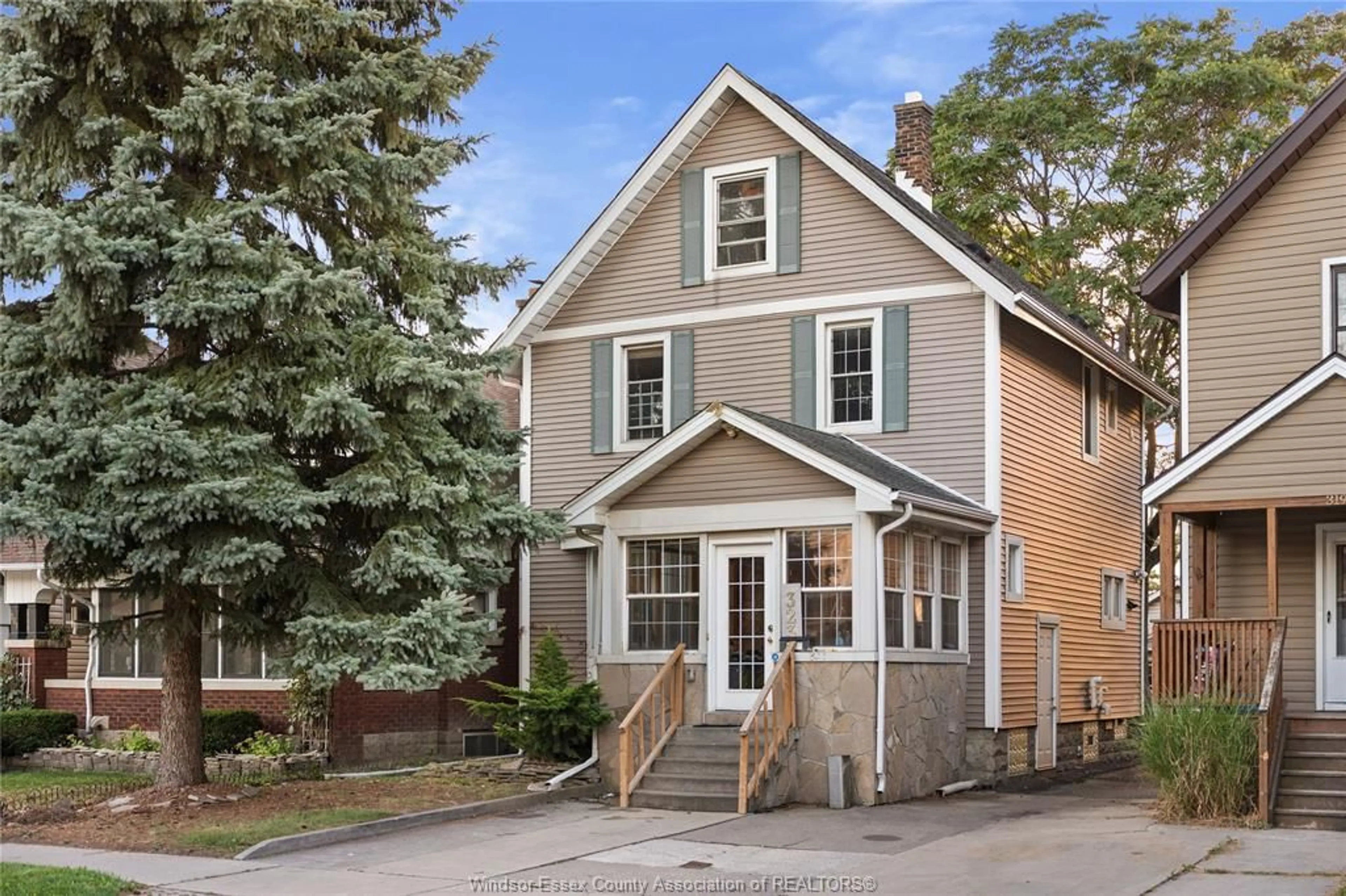 Home with vinyl exterior material, street for 323 RANDOLPH, Windsor Ontario N9B 2T4